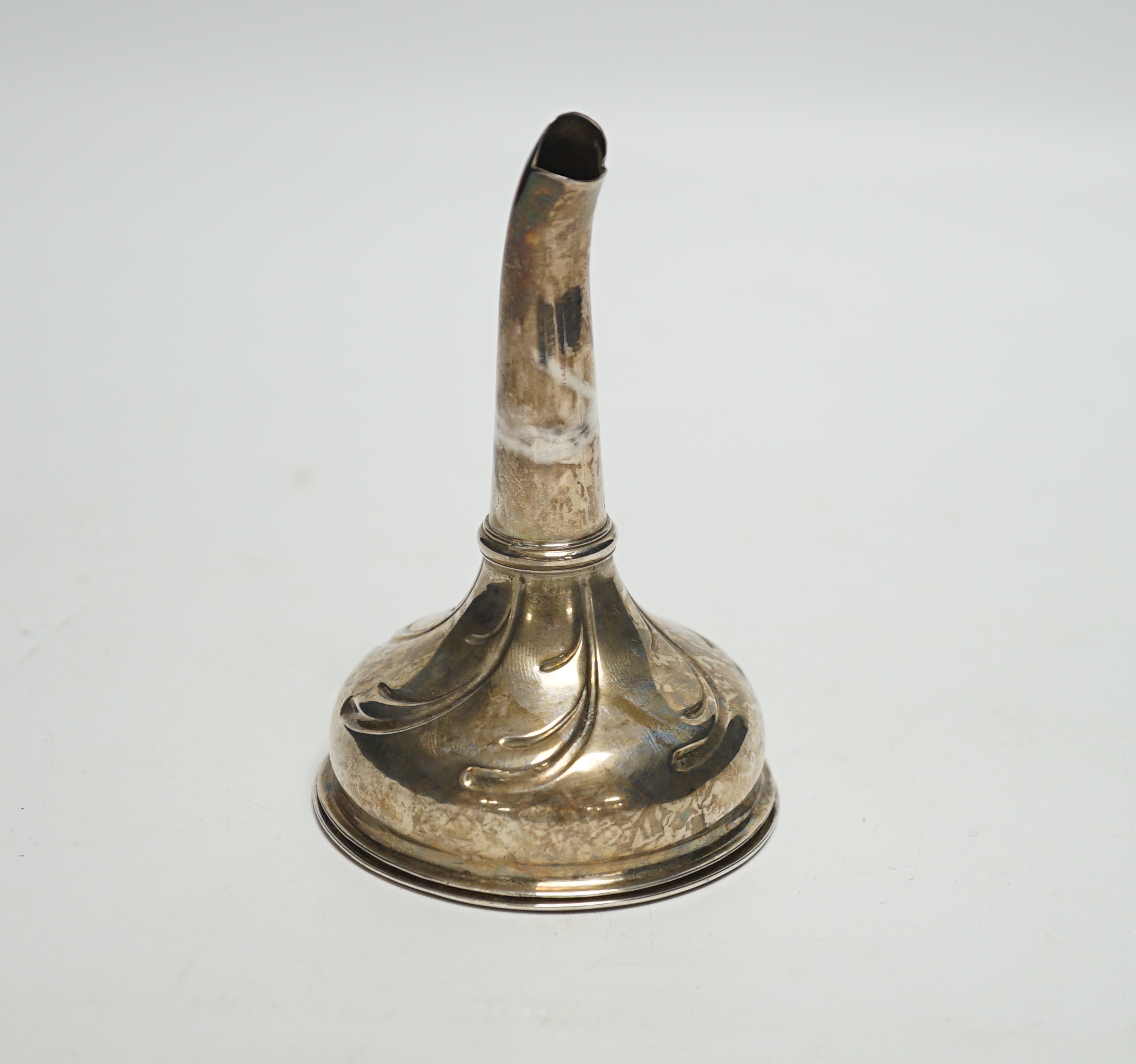 A George III Scottish silver wine funnel, lacking straining section, marks rubbed, 10.9cm.                                                                                                                                  