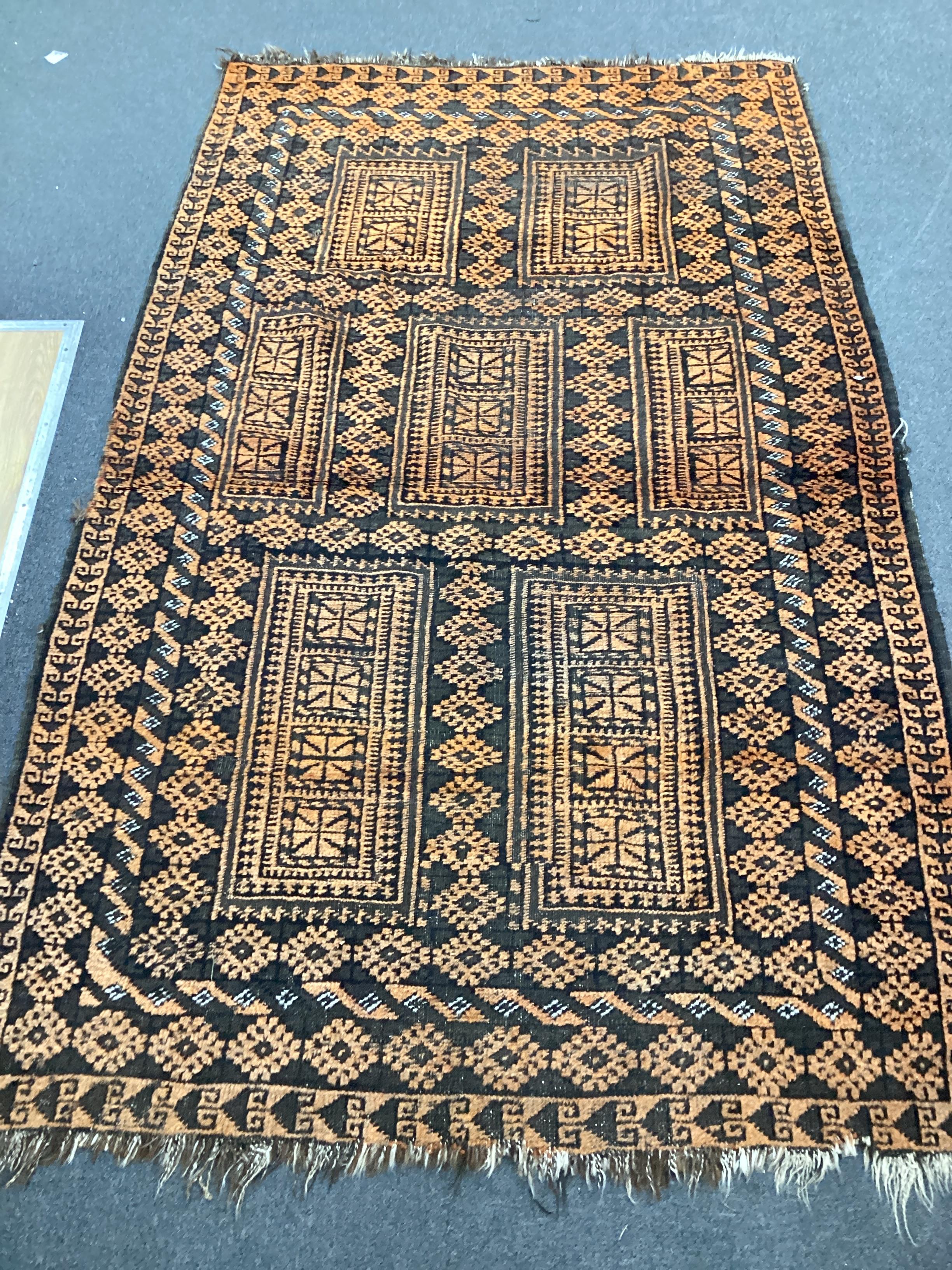 An Afghan geometric rug, 205cm x 138cm                                                                                                                                                                                      