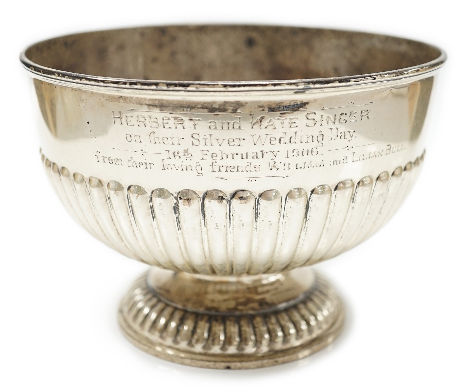 An Edwardian demi fluted silver presentation rose bowl, William Hutton & Sons, London, 1905, diameter 16.1cm, 11oz.                                                                                                         