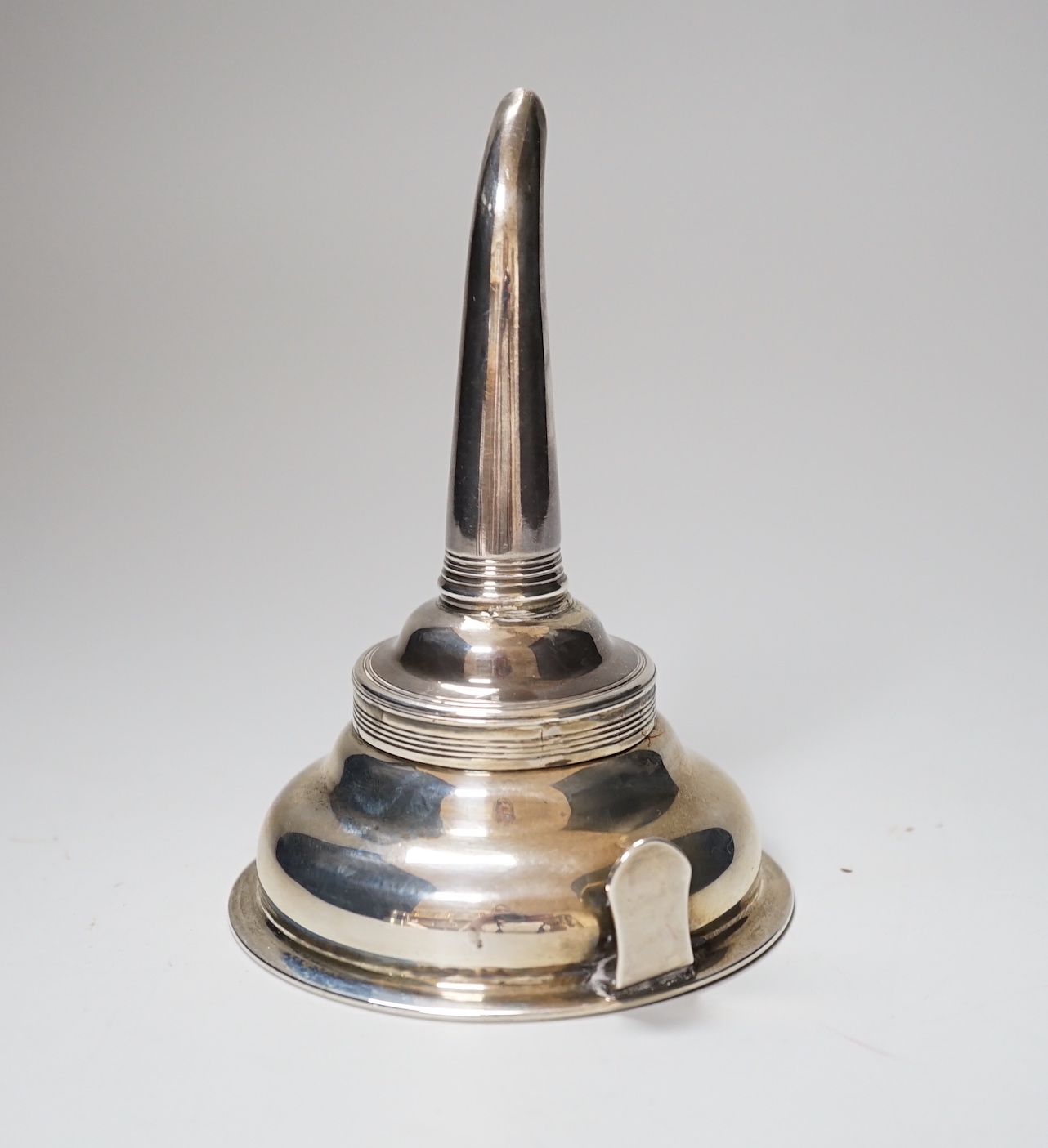 A George III silver wine funnel, with reeded banding, maker CF, London 1809, 12.5cm, 109 grams                                                                                                                              