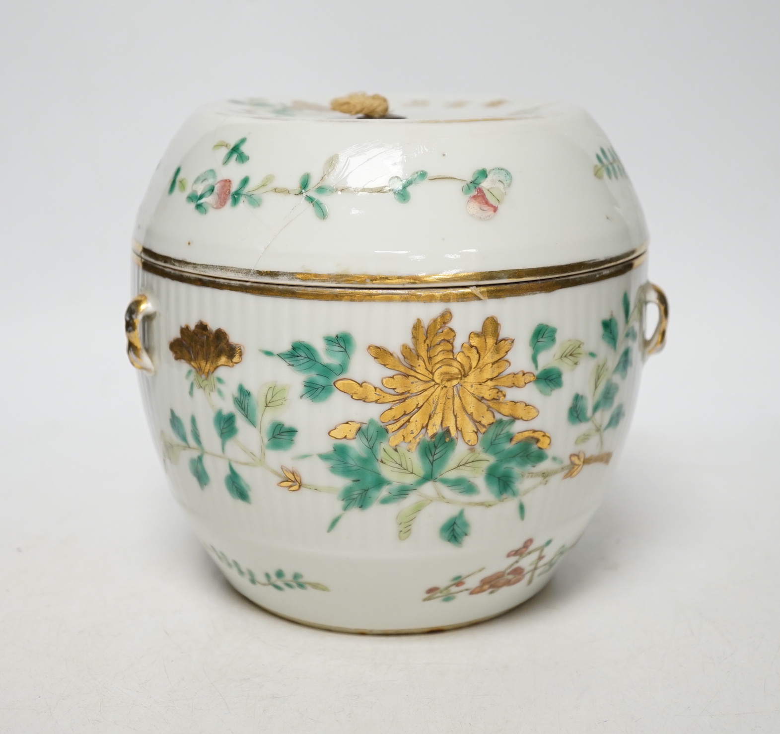 A Chinese enamelled porcelain barrel shaped jar and covered, 19th century, 16cm high                                                                                                                                        