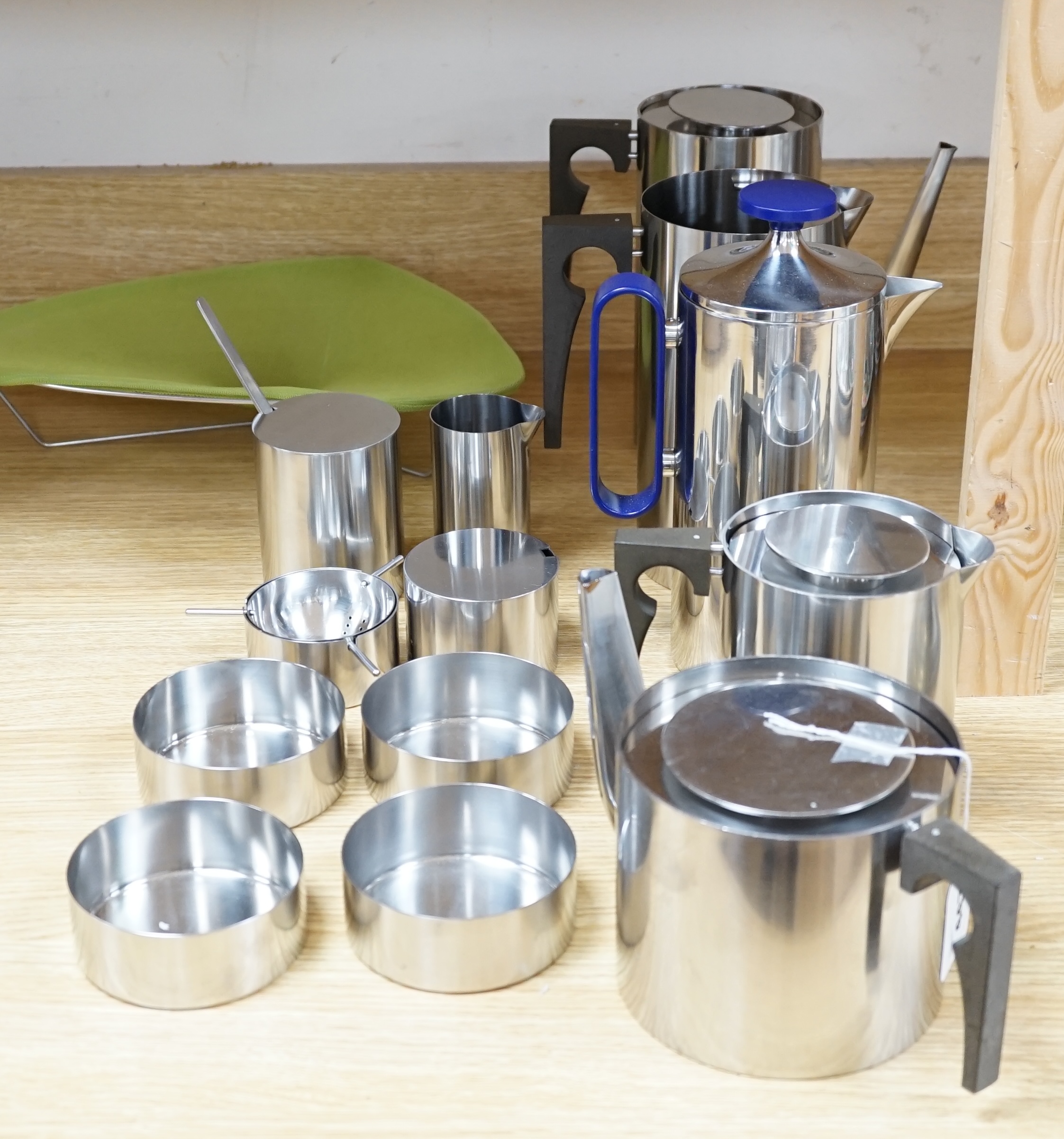 A thirteen piece suite of Arne Jacobsen stainless steel cylinder ware, coffee pot 24cm high                                                                                                                                 