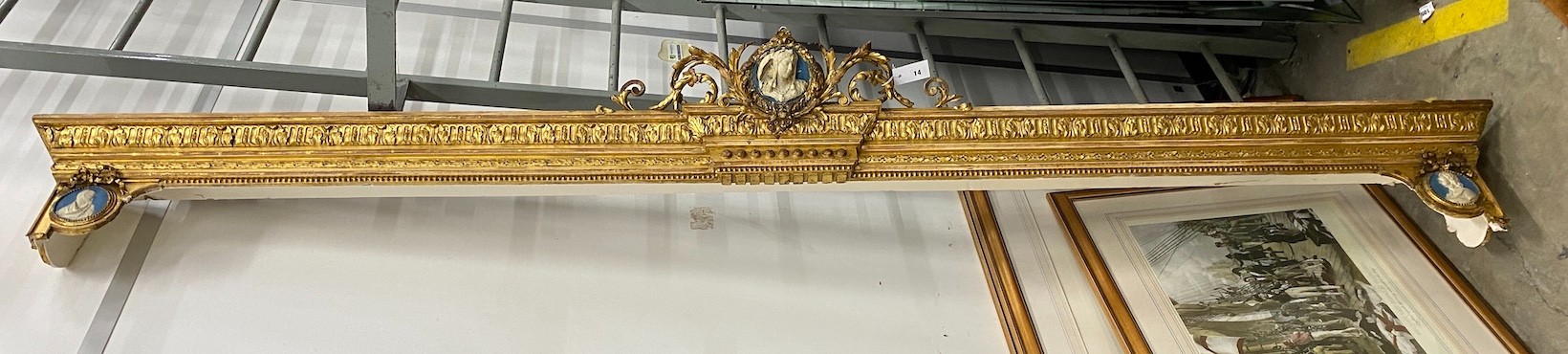 A Victorian carved giltwood and composition pediment with faux jasper panels, length 280cm                                                                                                                                  