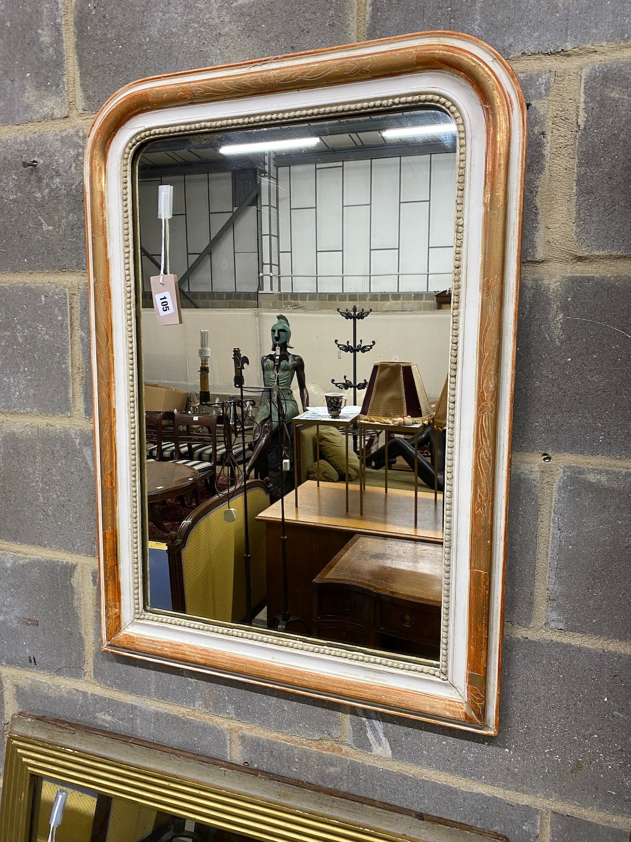 A 19th century French wall mirror, re-painted, width 62cm, height 86cm                                                                                                                                                      