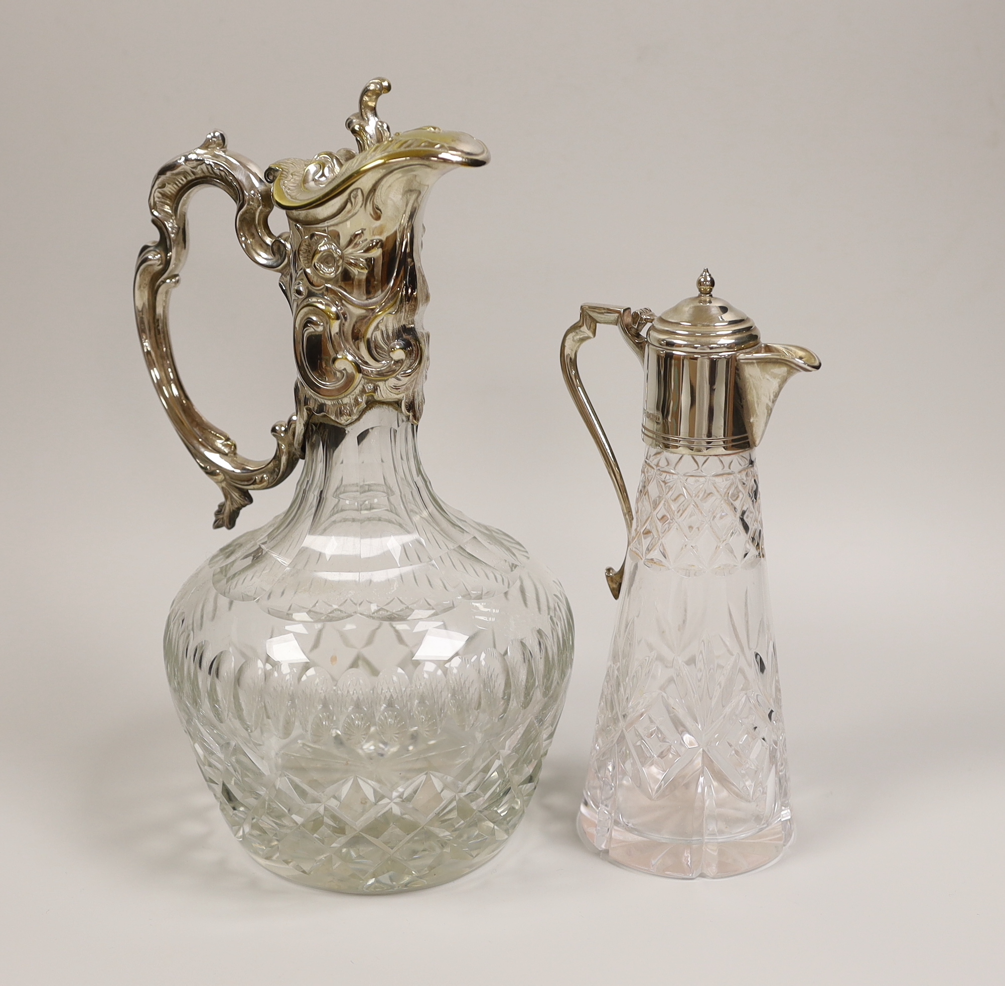 A modern silver mounted liqueur jug, Sheffield, 1993, 20.5cm and a plated mounted claret jug.                                                                                                                               