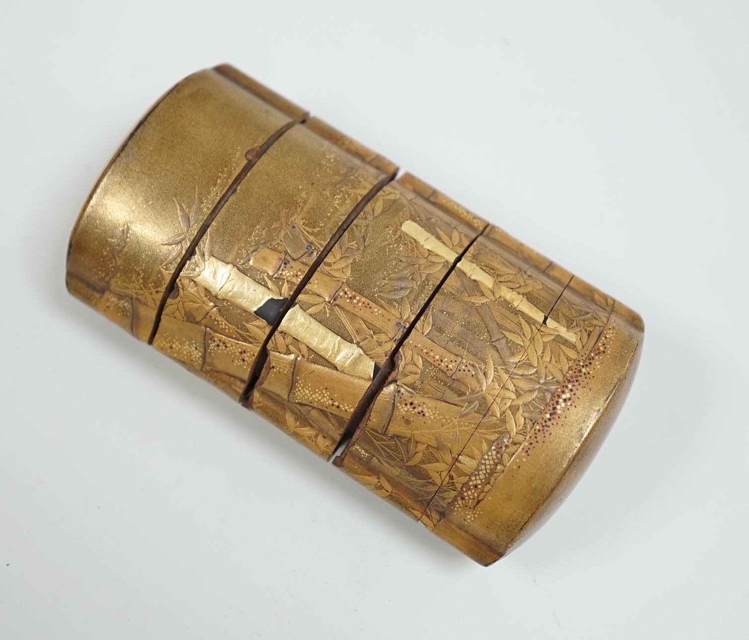 A 19th century Japanese gold lacquered four section inro, unsigned, 9cm high                                                                                                                                                