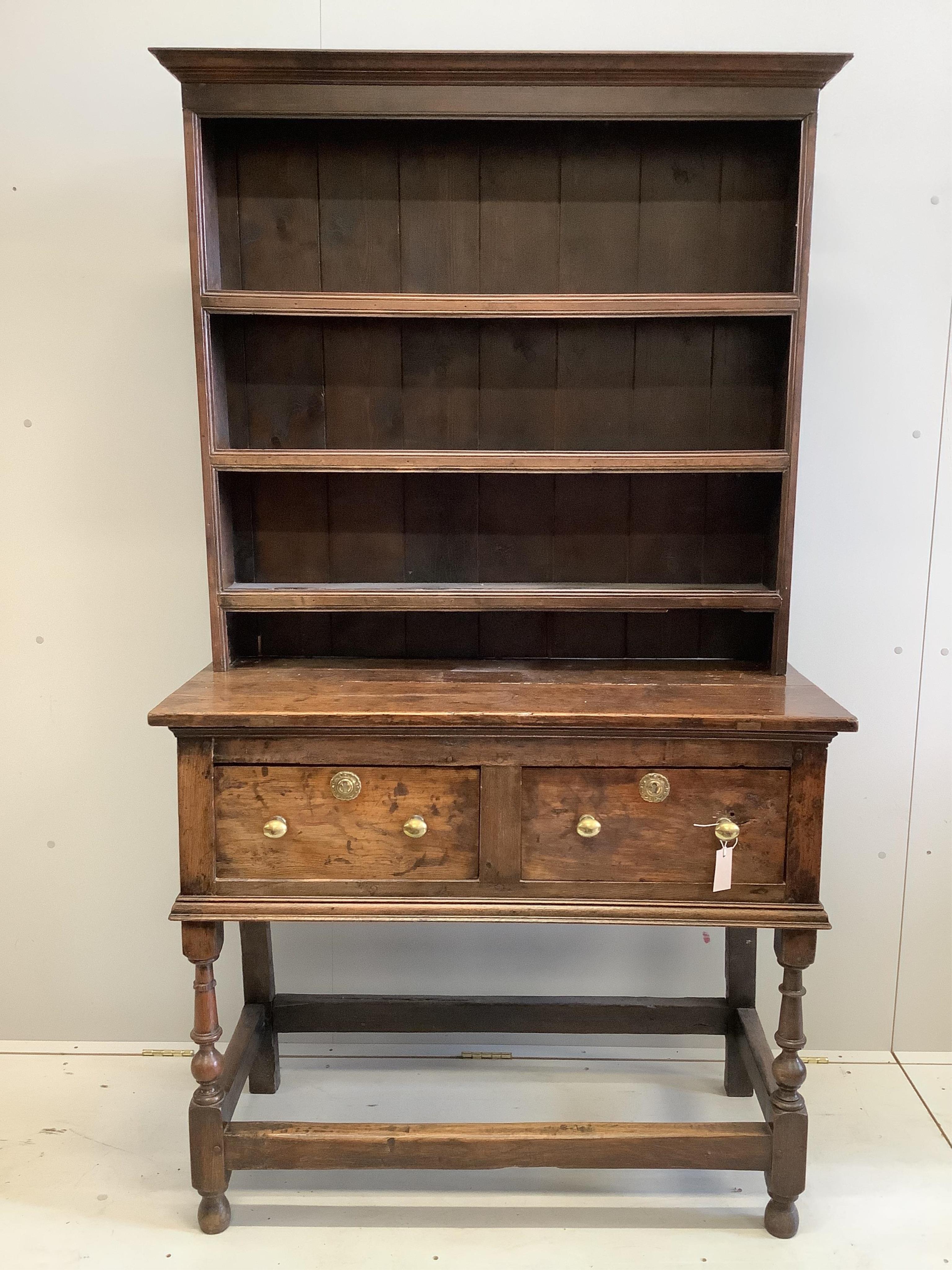 A small mid 18th century oak dresser, width 109cm, depth 49cm, height 191cm. Condition - poor-fair                                                                                                                          