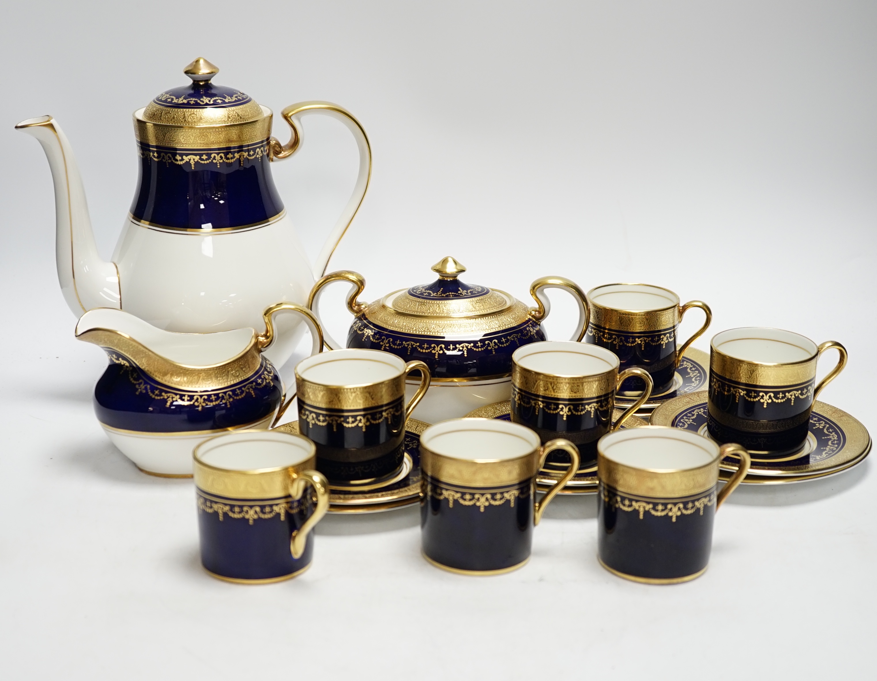 An Aynsley 'Georgian Cobalt' eight place setting coffee service (one coffee cup missing)                                                                                                                                    