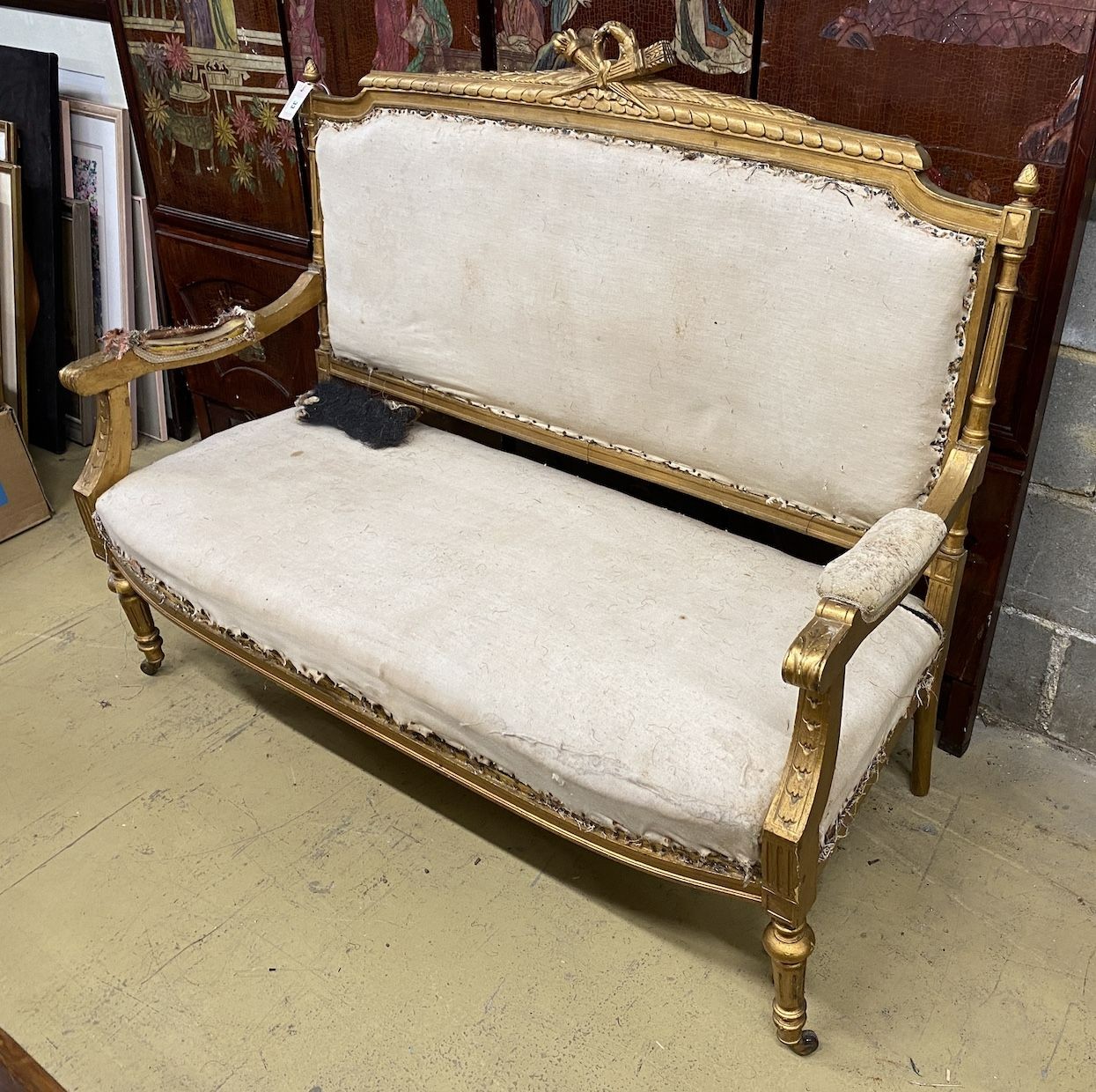 A 19th century French carved giltwood six piece salon suite, settee length 128cm, depth 53cm, height 108cm                                                                                                                  