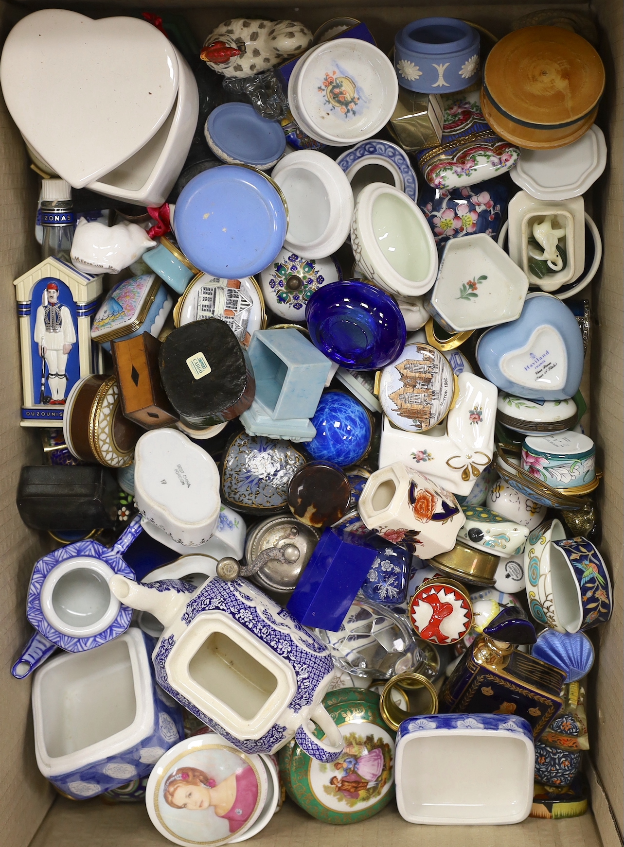 A large collection of porcelain and enamel trinket and patch boxes, together with miniature animals in glass and porcelain, (approximately 80 pieces)                                                                       