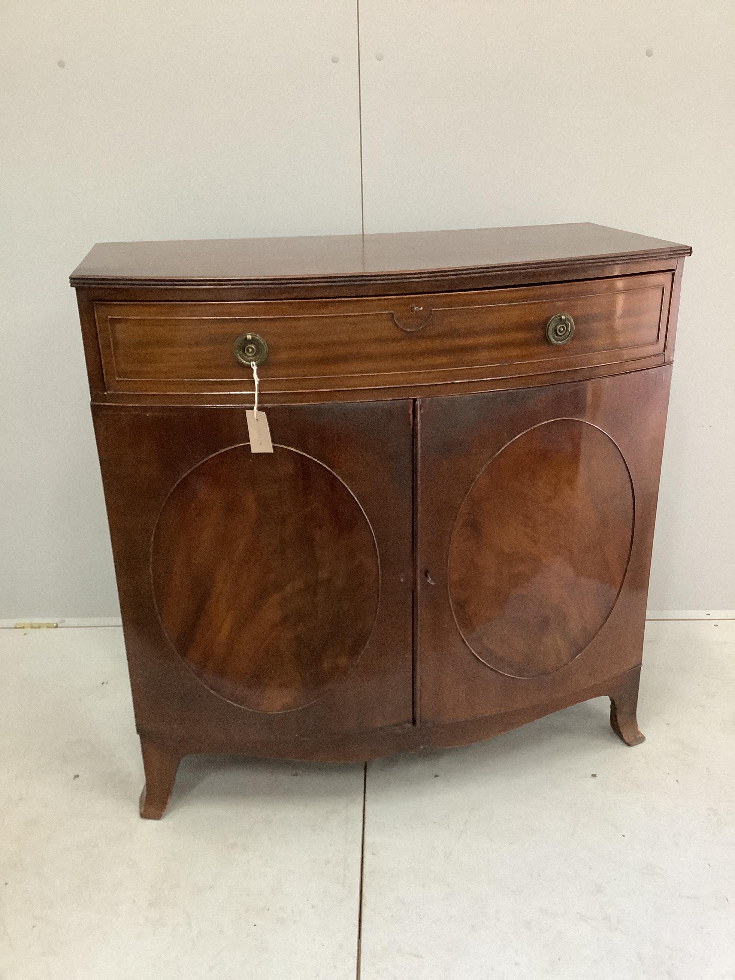 An Edwardian mahogany bowfront side cabinet, width 100cm, depth 49cm, height 100cm                                                                                                                                          