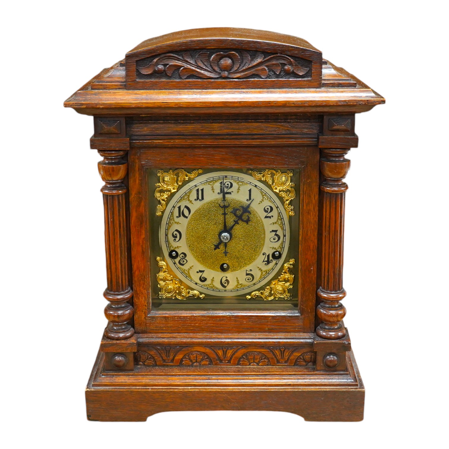 A late 19th century German oak three train mantel clock, 38.5cm high. Condition - fair, untested                                                                                                                            