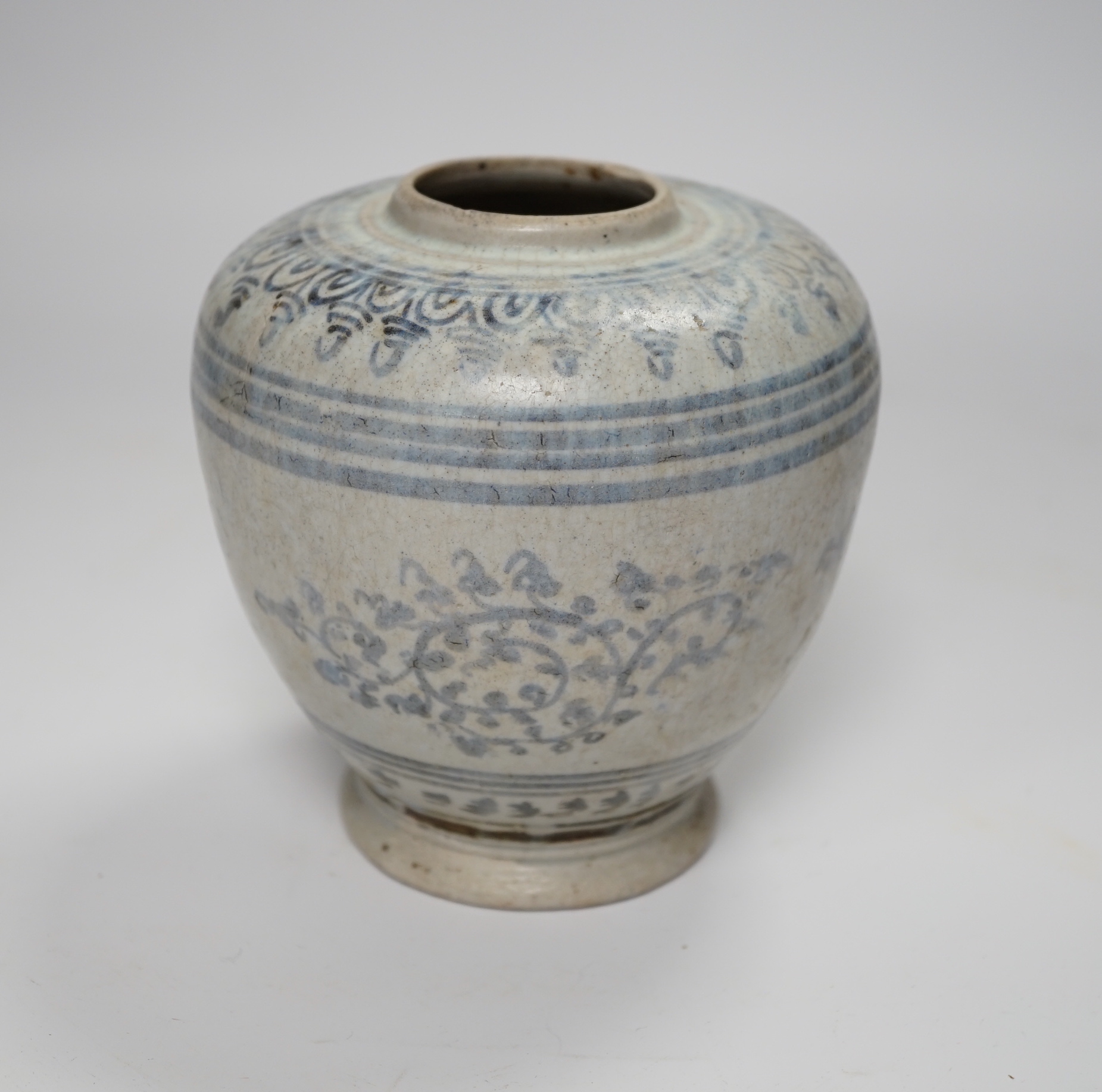 A Sawankhalok celadon jar, 15th/16th century, 13cm high                                                                                                                                                                     