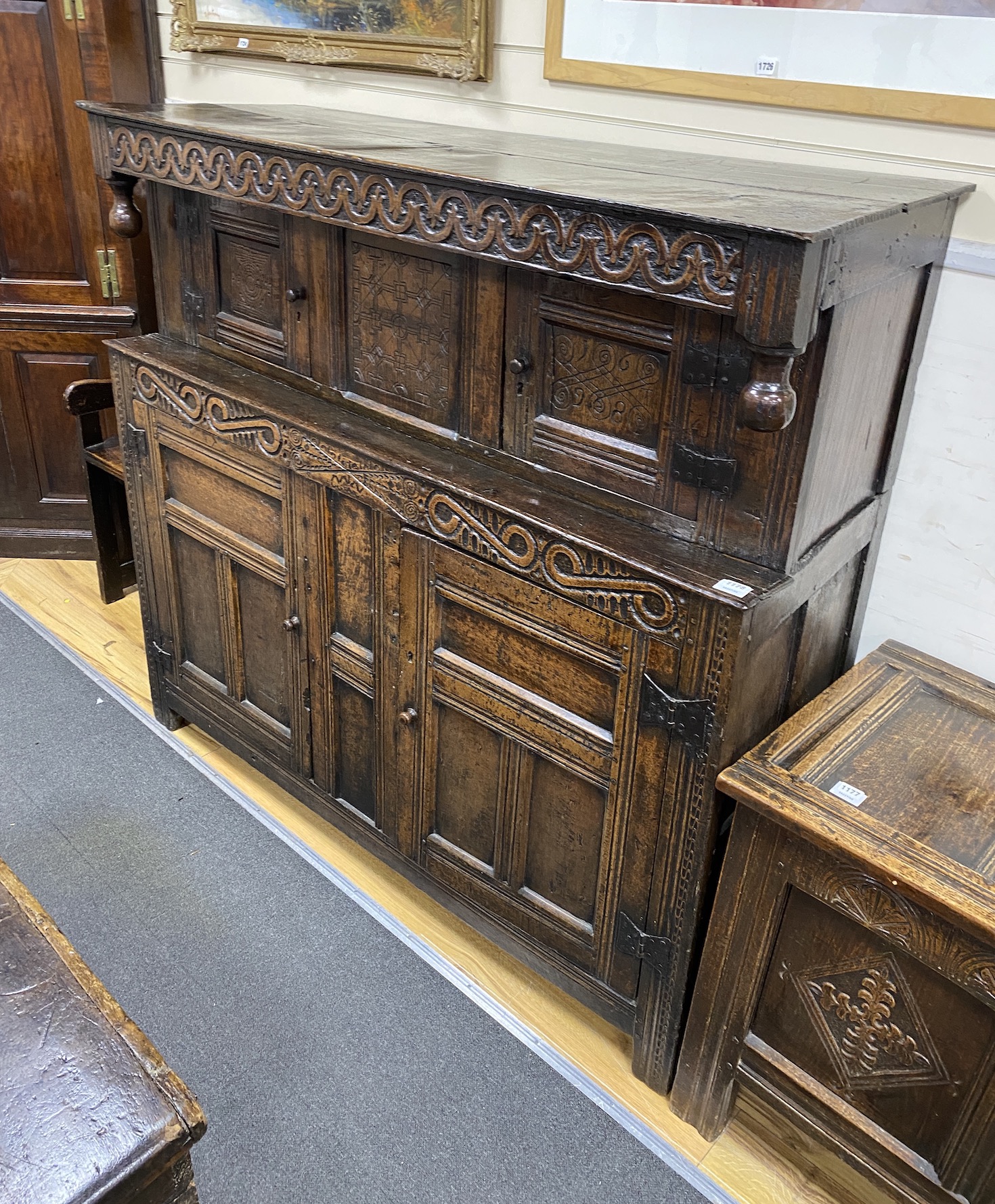 A William III carved oak court cupboard, dated 1698, width 152cm, depth 56cm, height 140cm                                                                                                                                  