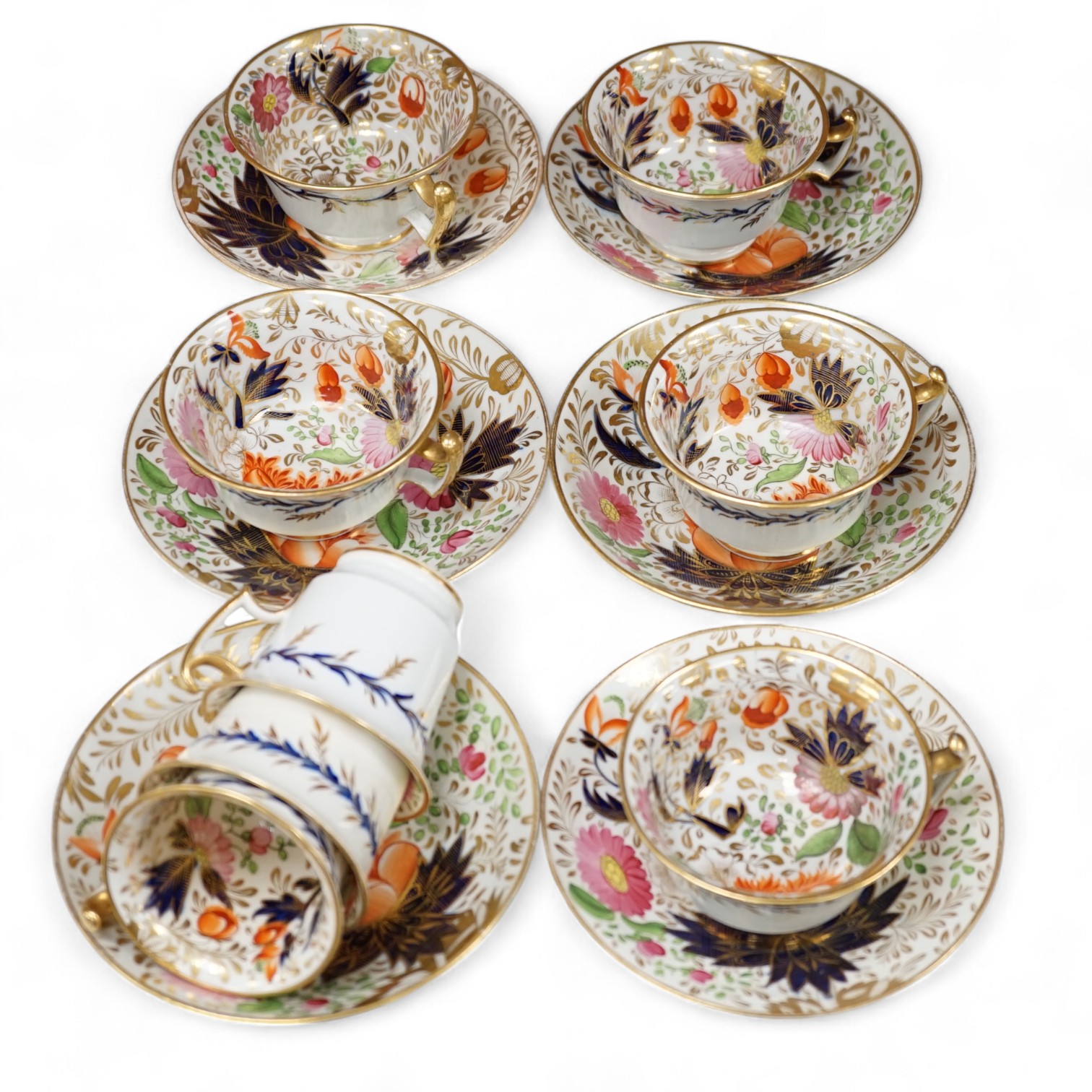 An early 19th century London shape part tea set, probably Coalport. Condition - some damage                                                                                                                                 