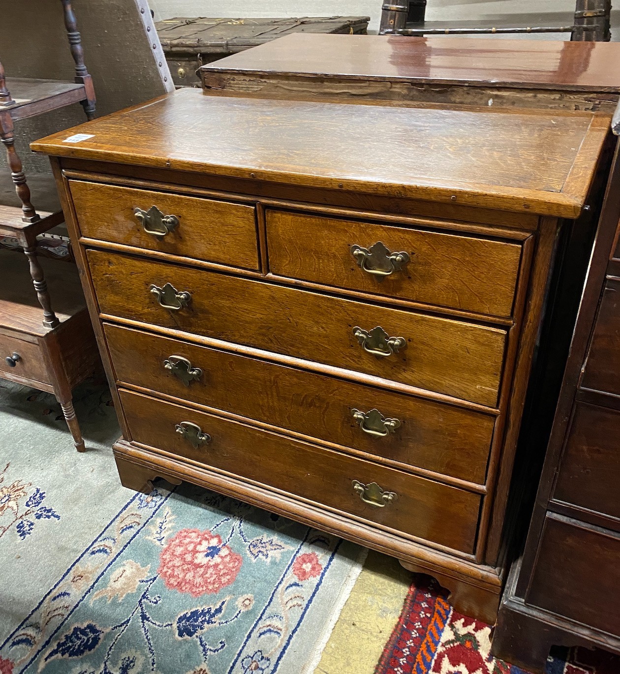 A George III oak chest of drawers, width 94cm, depth 48cm, height 87cm                                                                                                                                                      