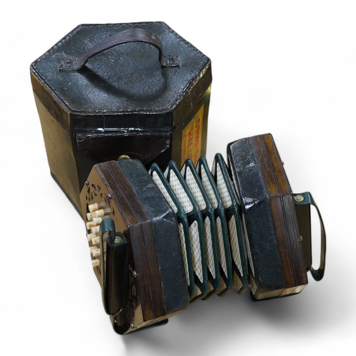 A leather cased mid-19th century Lachenal, London, 23 button concertina. Condition - fair to good, some wear to the case. The bellows appear sound and strong.                                                              