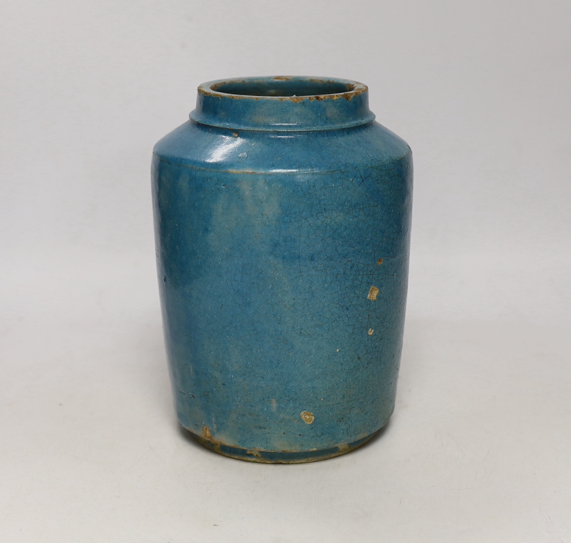 A 19th century Persian turquoise glazed fritware jar, 20cm high                                                                                                                                                             