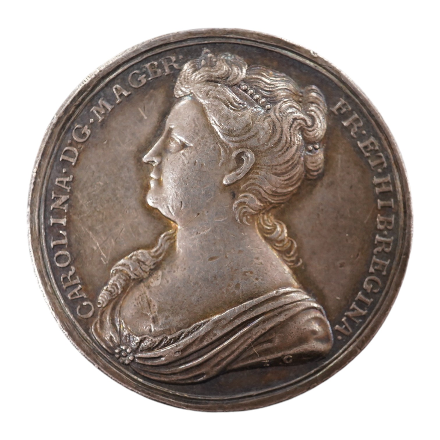 British Royal commemorative medals, Queen Caroline coronation 1727, a silver medal by J. Croker, bust left, rev. queen standing between Religion and Britannia, 34mm, (MI II, 480/8; E 512), toned, good VF                 