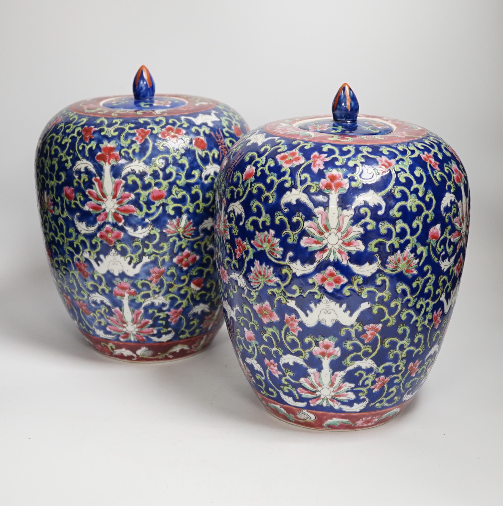 A pair of Chinese blue ground jars and covers, 29cm                                                                                                                                                                         