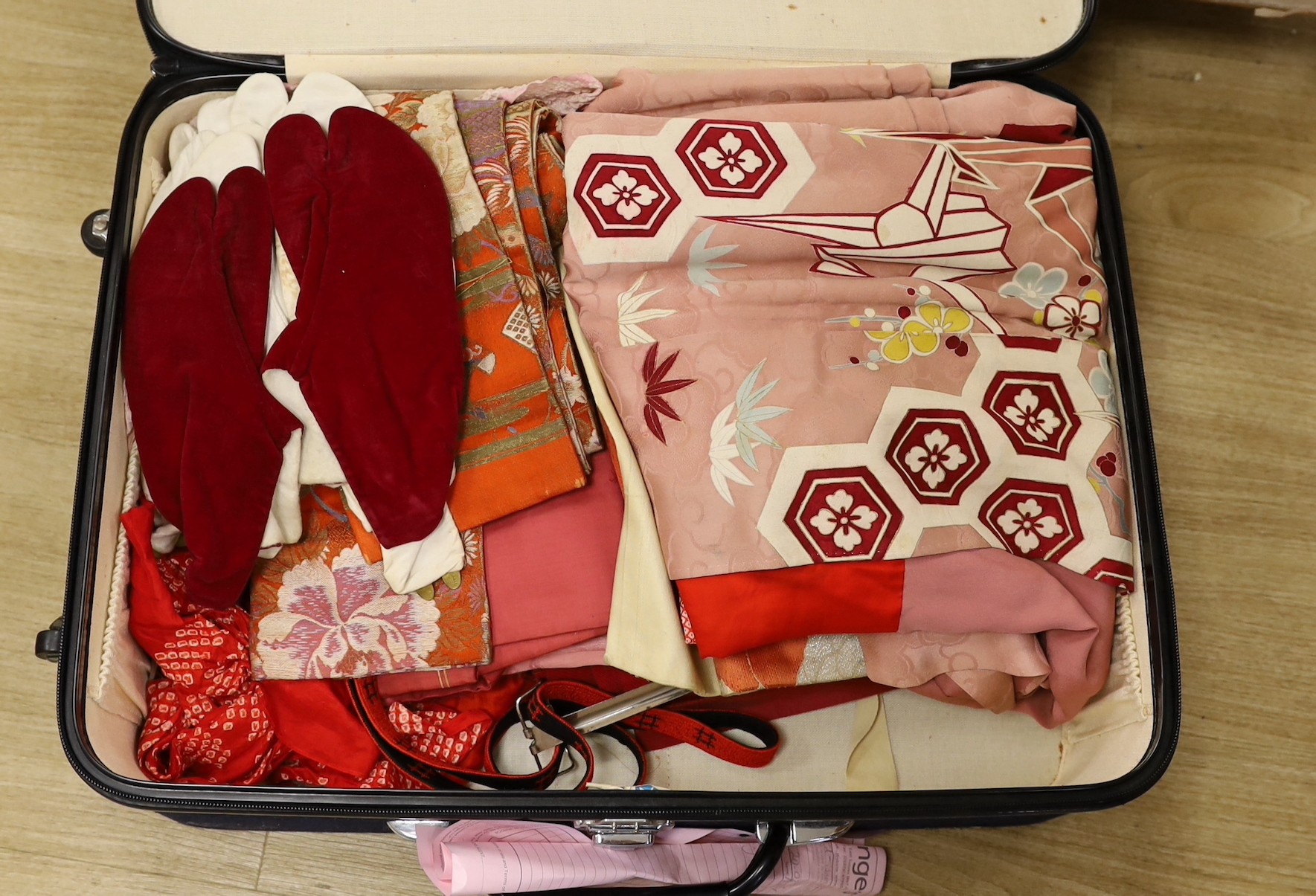 A quantity of Japanese clothing, kimonos, shoes etc                                                                                                                                                                         