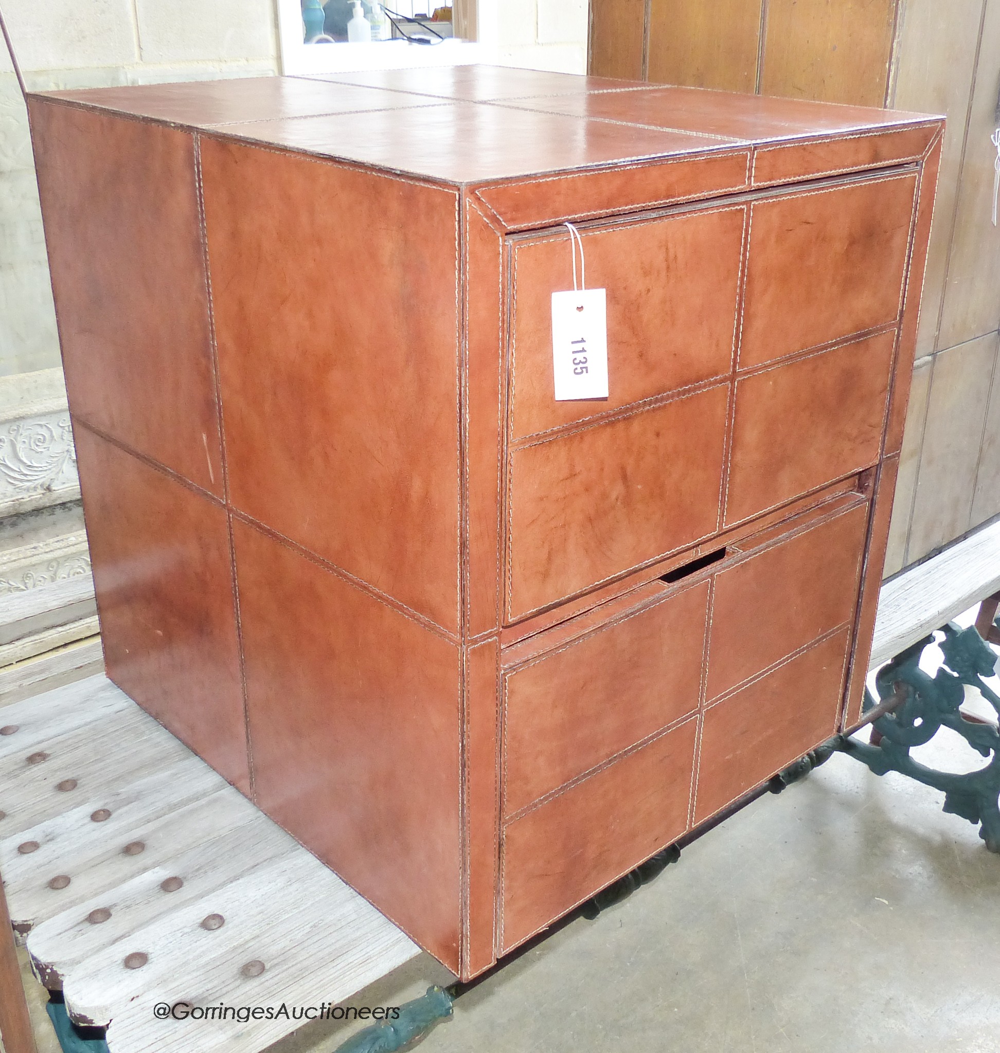 Stitched Tan leather two draw filing cabinet. W-54, D-60, H-62cm.                                                                                                                                                           