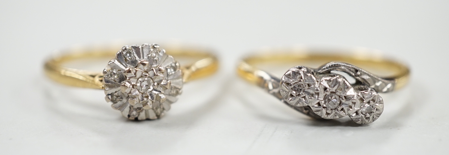 Two 18ct and diamond chip set rings including three stone crossover, size M, gross weight 5.4 grams.                                                                                                                        