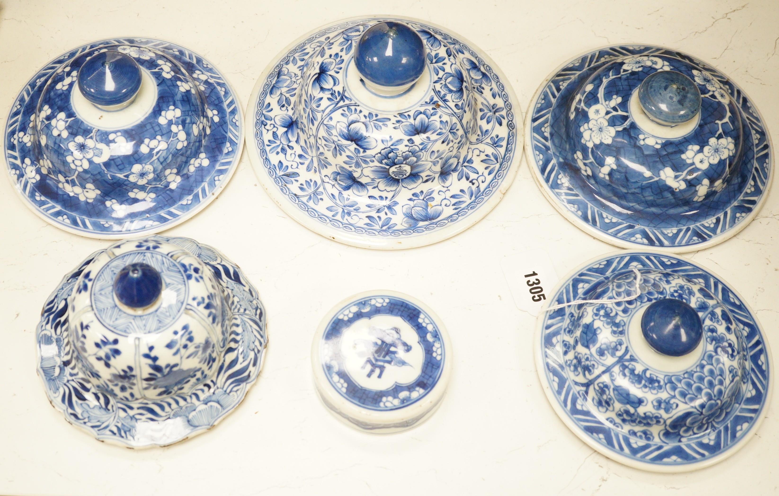 Six Chinese Kangxi blue and white vases and jar covers, largest 21.5cm diameter., Provenance - D.C.Monk & Son, former dealers based in Kensington Church Street, London W8                                                  