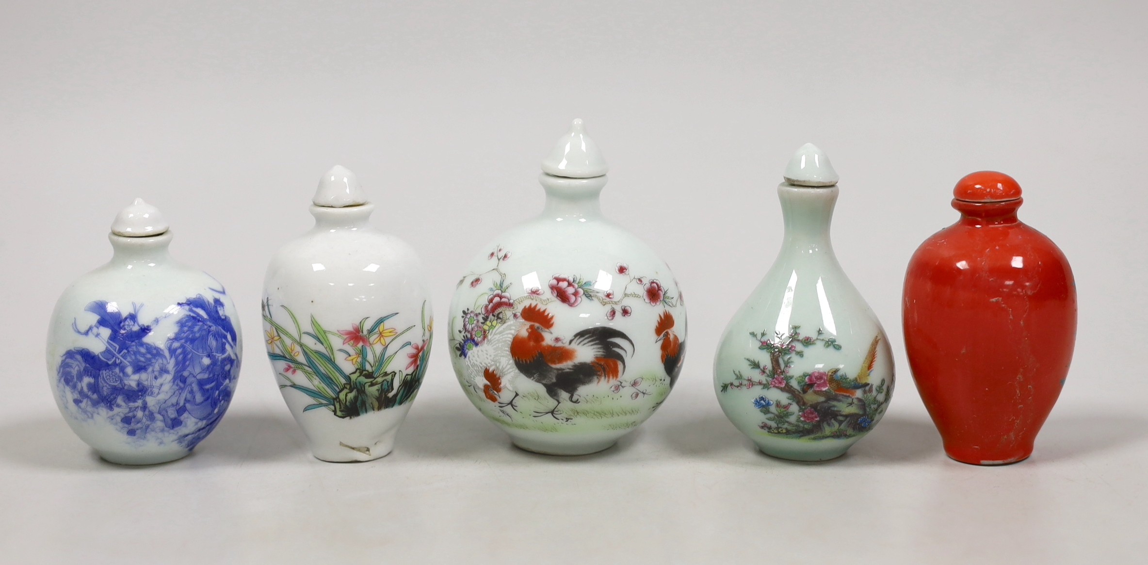 Five Chinese porcelain snuff bottles                                                                                                                                                                                        