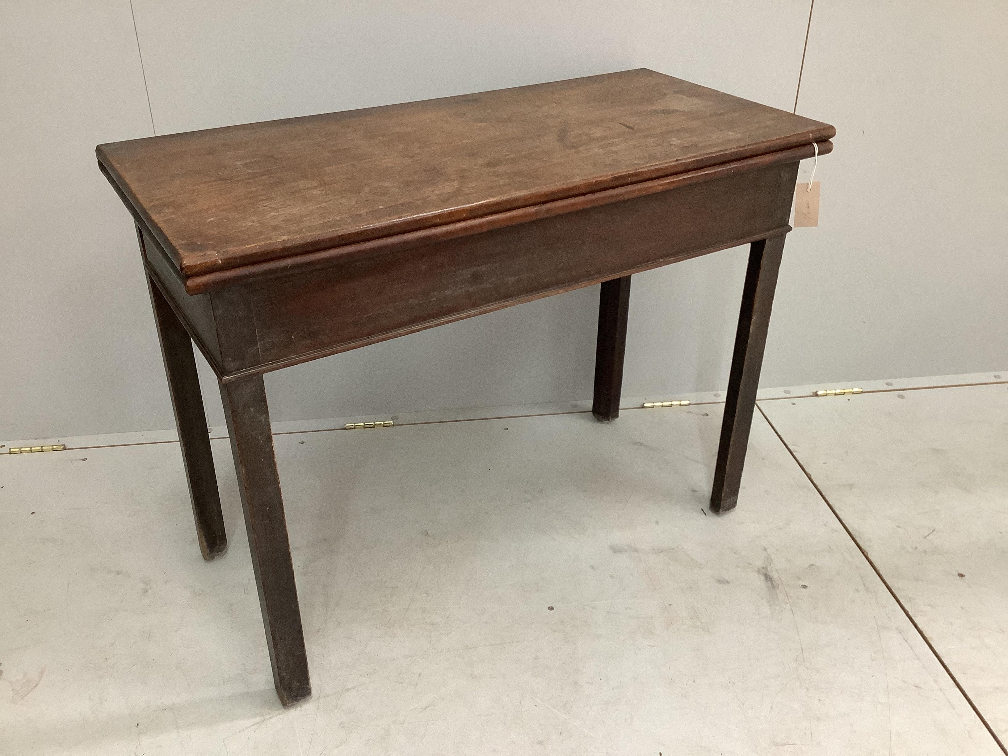 A George III rectangular mahogany folding tea table, width 96cm, depth 45cm, height 72cm                                                                                                                                    