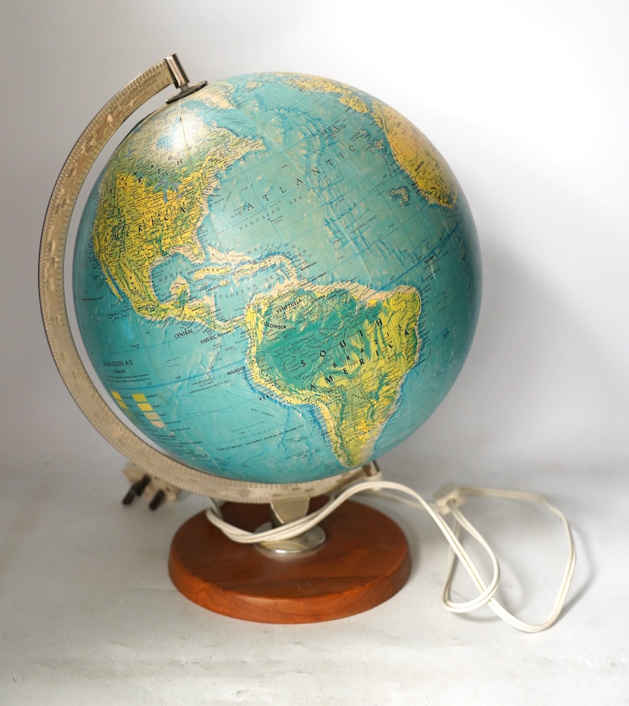 An illuminated 1970s Scan-Globe A/S, Denmark, on stand, 30cm diameter. Condition - fair.                                                                                                                                    