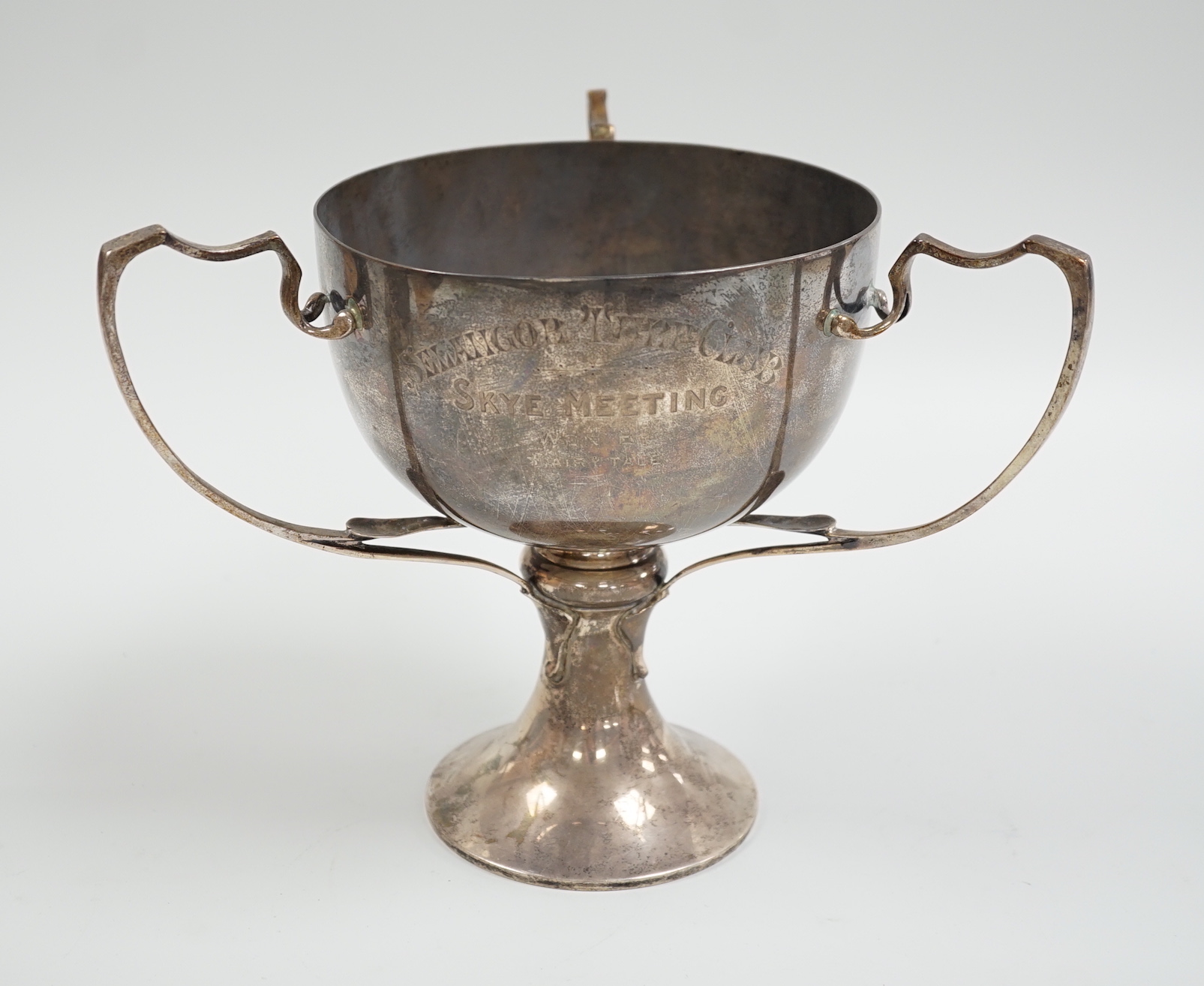 A George V silver tri-handled presentation cup, with engraved inscription, Charles Boyton & Son Ltd, London, 1912, height 19.6cm, 26.5oz.                                                                                   