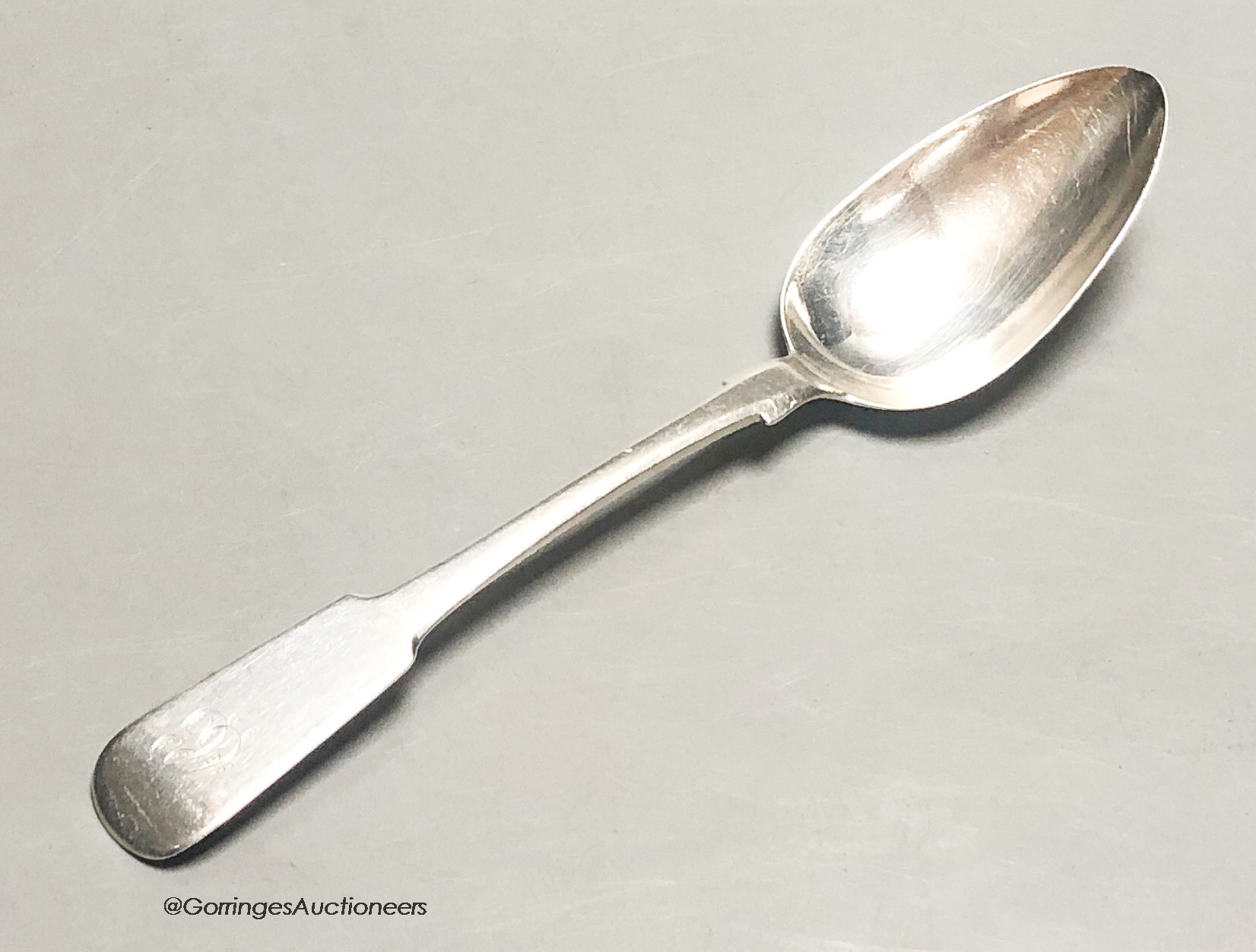 An early 19th century Scottish provincial silver fiddle pattern dessert spoon, by John & Patrick Riach, Forres, c.1825, 17.4cm, 34 grams.                                                                                   