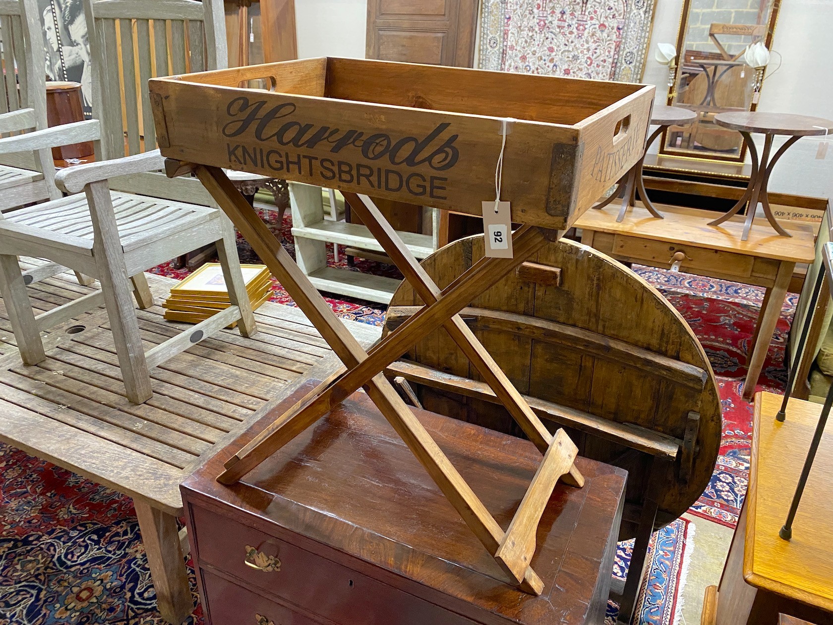 A pine 'Harrods' butler's tray on folding stand, width 65cm, depth 45cm, height 78cm                                                                                                                                        