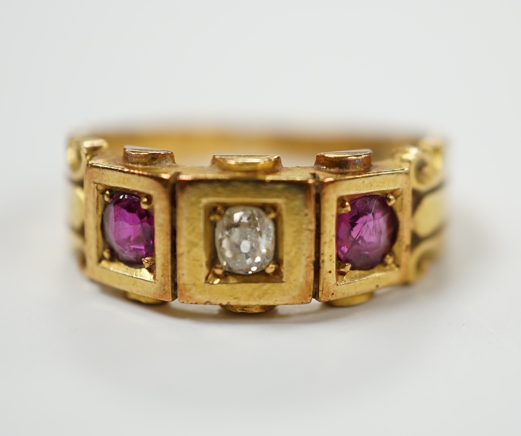 A late Victorian 18ct gold, ruby and diamond set three stone ring, size J, gross weight 4 grams. Condition - fair                                                                                                           