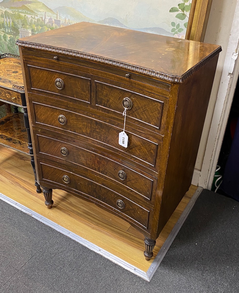 A small reproduction George III style concave mahogany four drawer chest, fitted slide, width 60cm, depth 39cm, height 80cm                                                                                                 