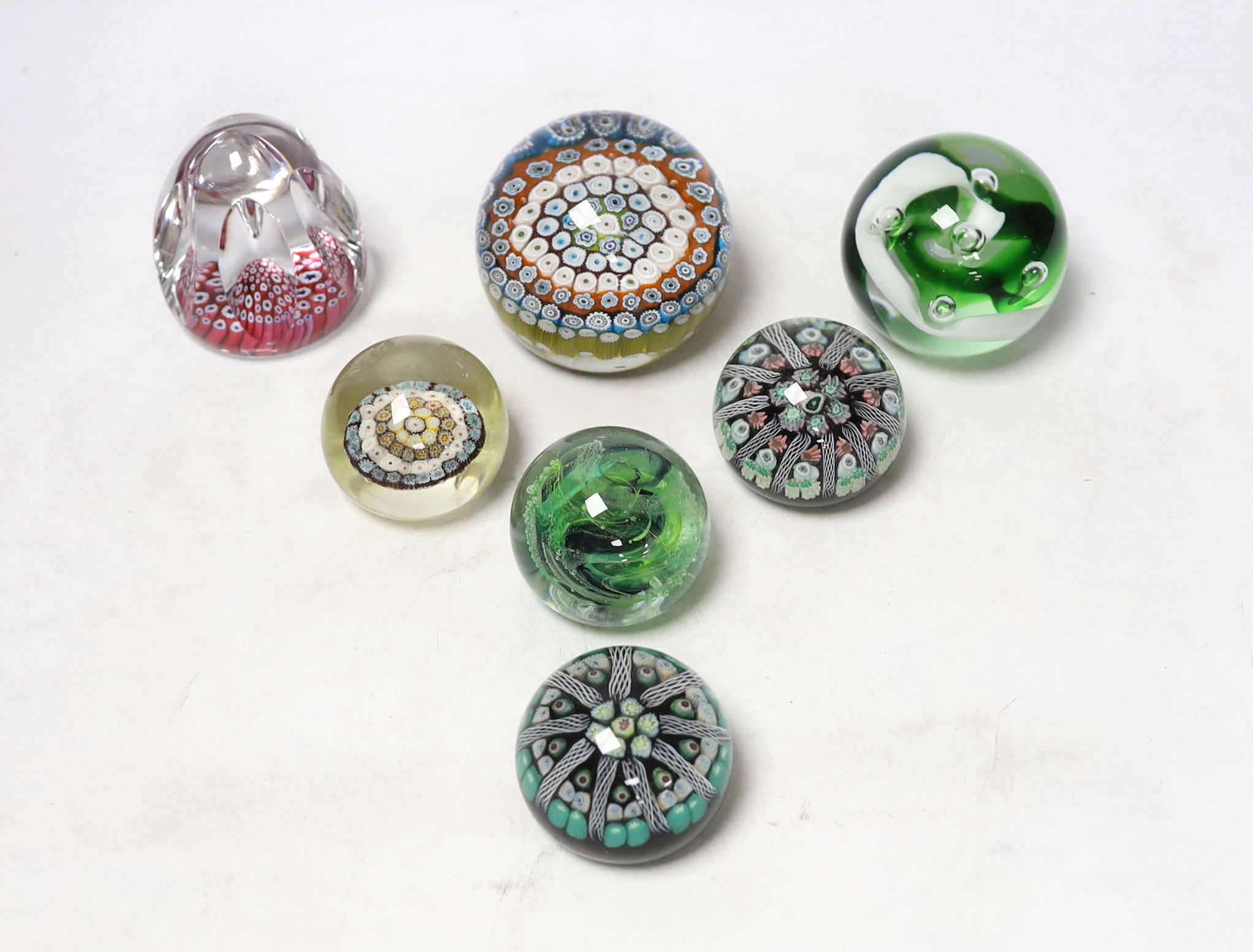 Seven Whitefriars and other paperweights, largest 8cm wide                                                                                                                                                                  