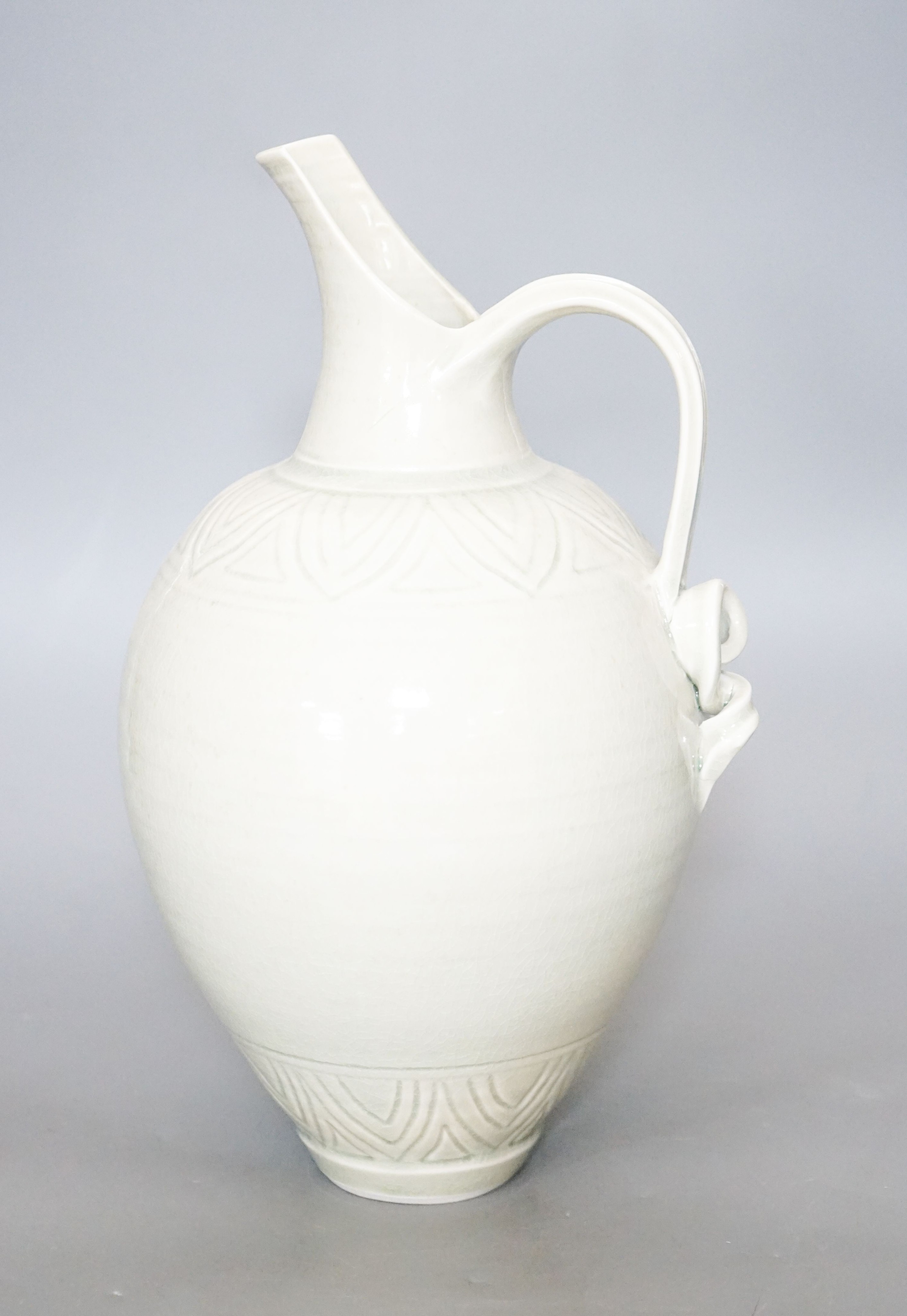 Bridget Drakeford (b.1946), a celadon glazed porcelain jug 30cm                                                                                                                                                             