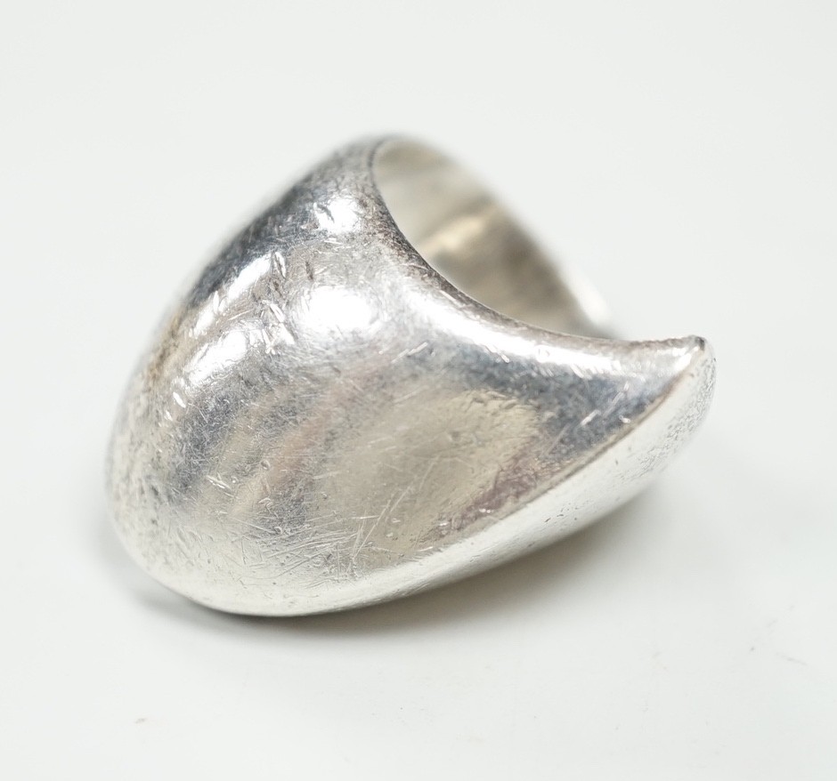 A 1960's Georg Jensen sterling silver dress ring, design no. 90, London import marks for 1966, size N/O.                                                                                                                    