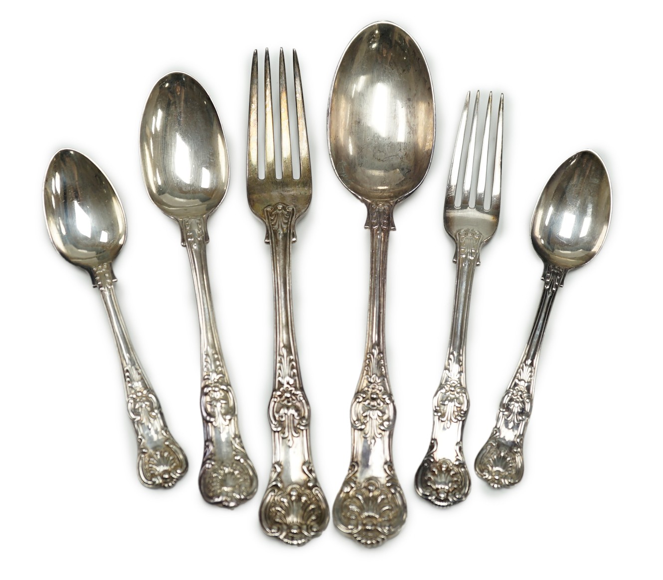 A harlequin part canteen of 19th century and later silver Queen's pattern cutlery, various dates and makers including a set of nine table forks, by William Robert Smily, London, 1855, a set of eight table spoons, Wakely 