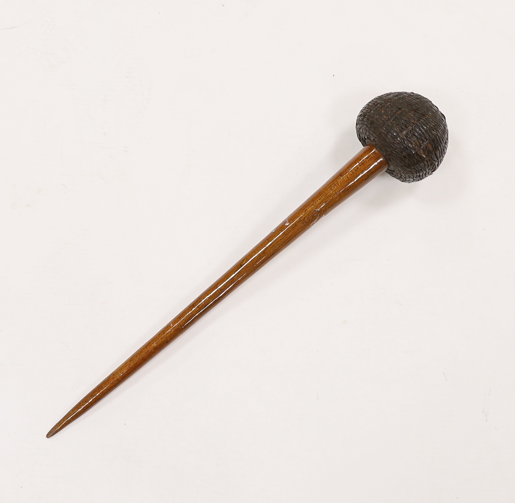 An African carved wooden club in the form of a knobkerry, with swollen head covered in basket weave                                                                                                                         