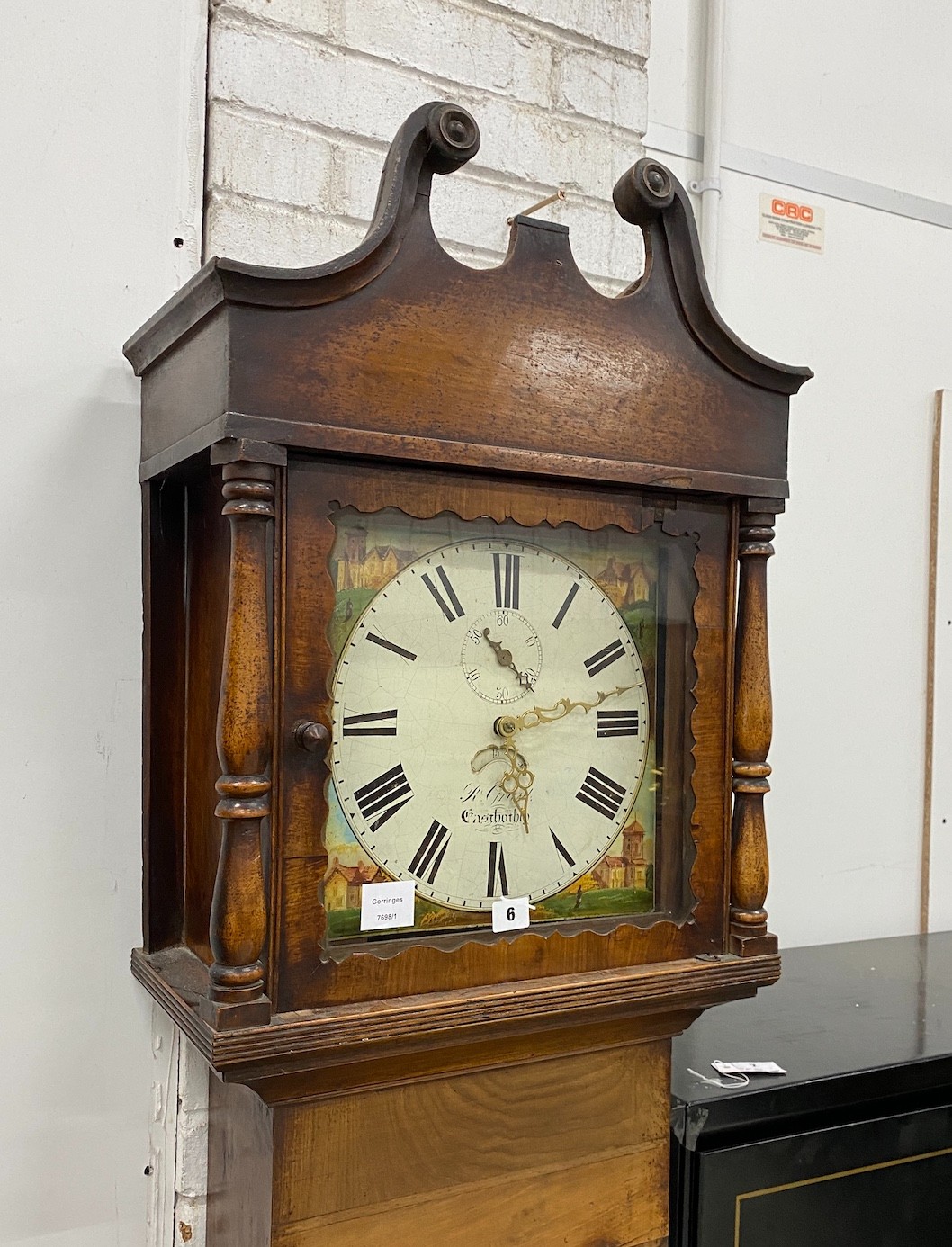 An early 19th century mahogany thirty hour longcase clock, the painted dial marked R. Grant, East Hoathly, height 216cm                                                                                                     
