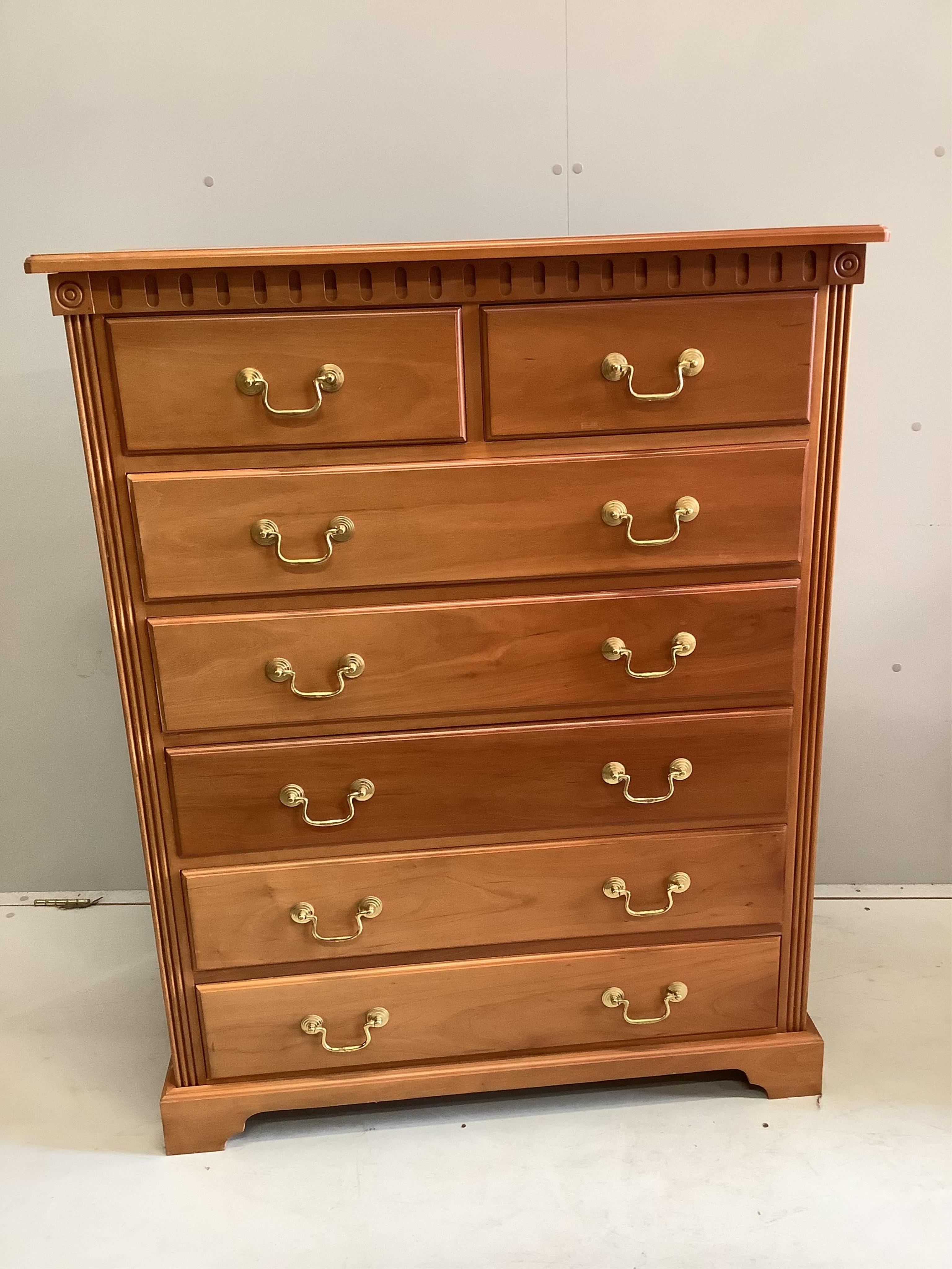 A reproduction cherry chest of drawers, width 97cm, depth 48cm, height 122cm. Condition - fair                                                                                                                              