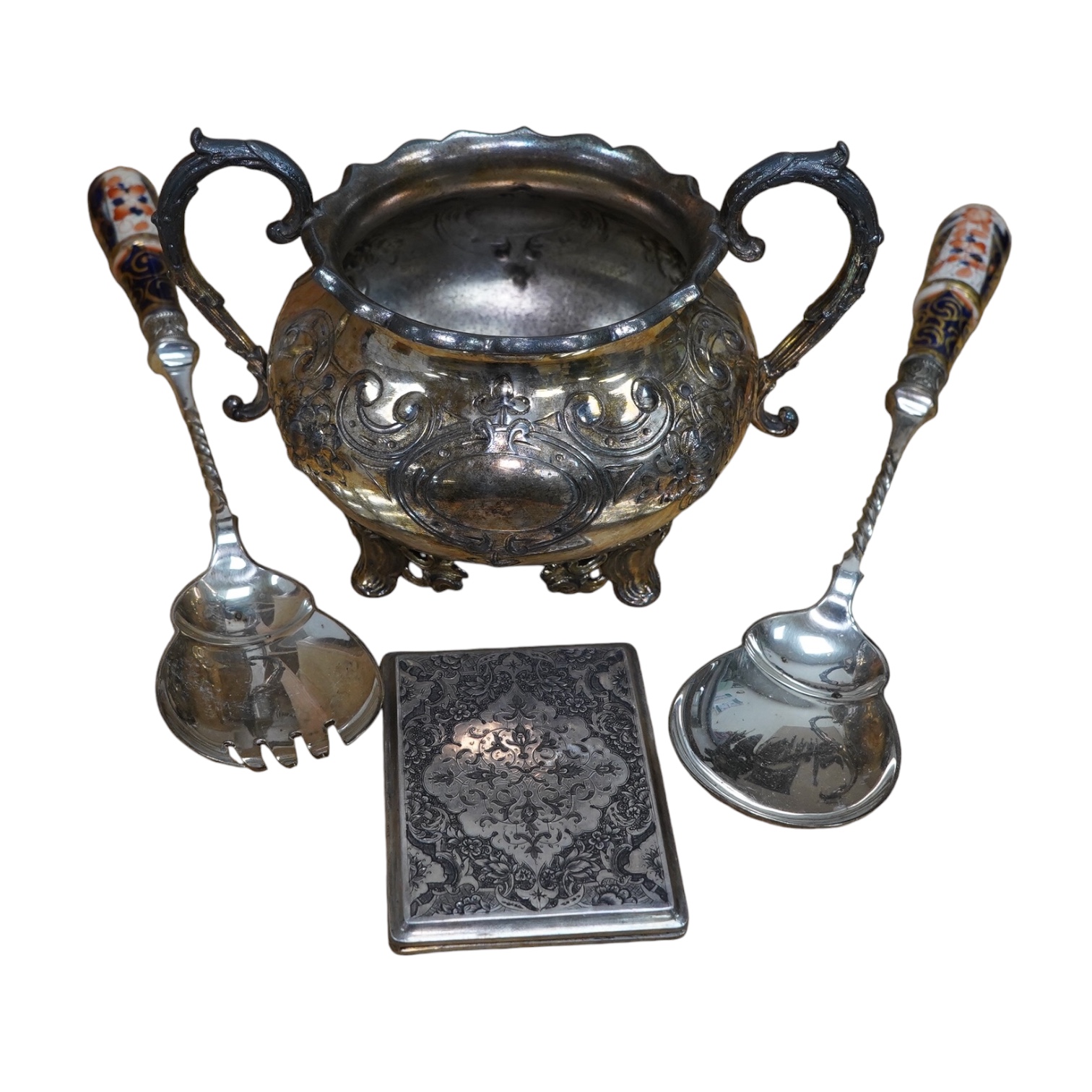 A small quantity of silver flatware, assorted plated cutlery, napkin rings and servers. Condition - varies, mostly fair                                                                                                     