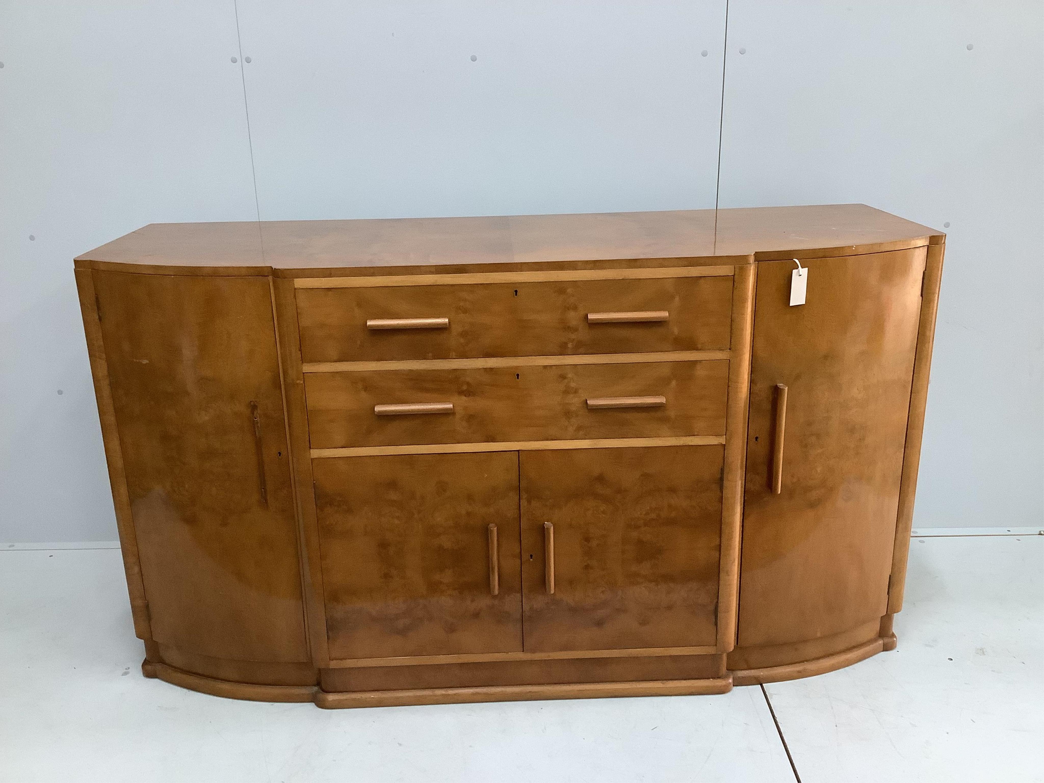 A Maples golden walnut sideboard, width 175cm, height 97cm. Condition - fair to good                                                                                                                                        