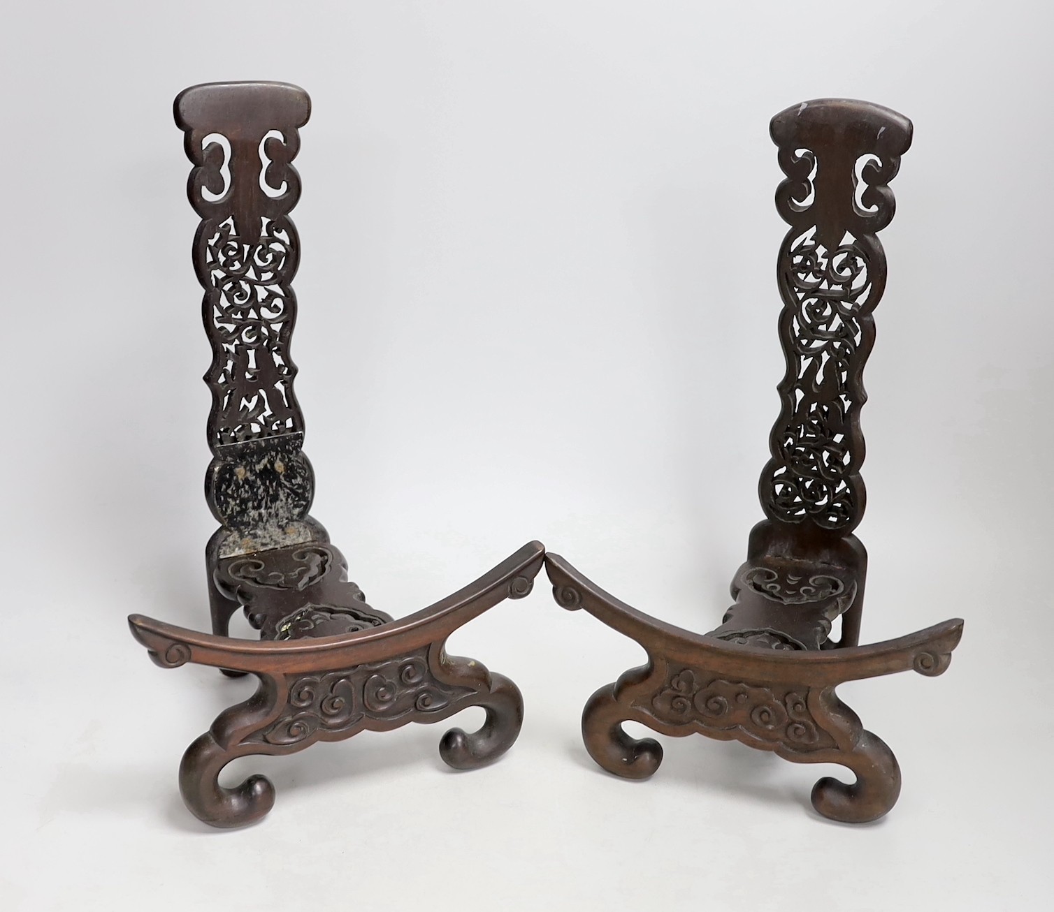 A pair of Chinese carved hongmu dish stands, late 19th century, 32cm tall                                                                                                                                                   