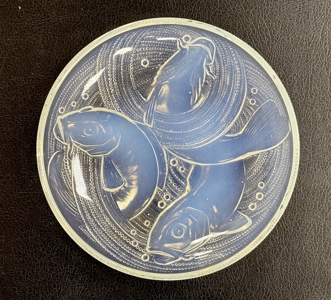 Pierre D'Avesn - a Lalique style opalescent glass dish, moulded in relief with three carp among waves, 30cm diameter                                                                                                        