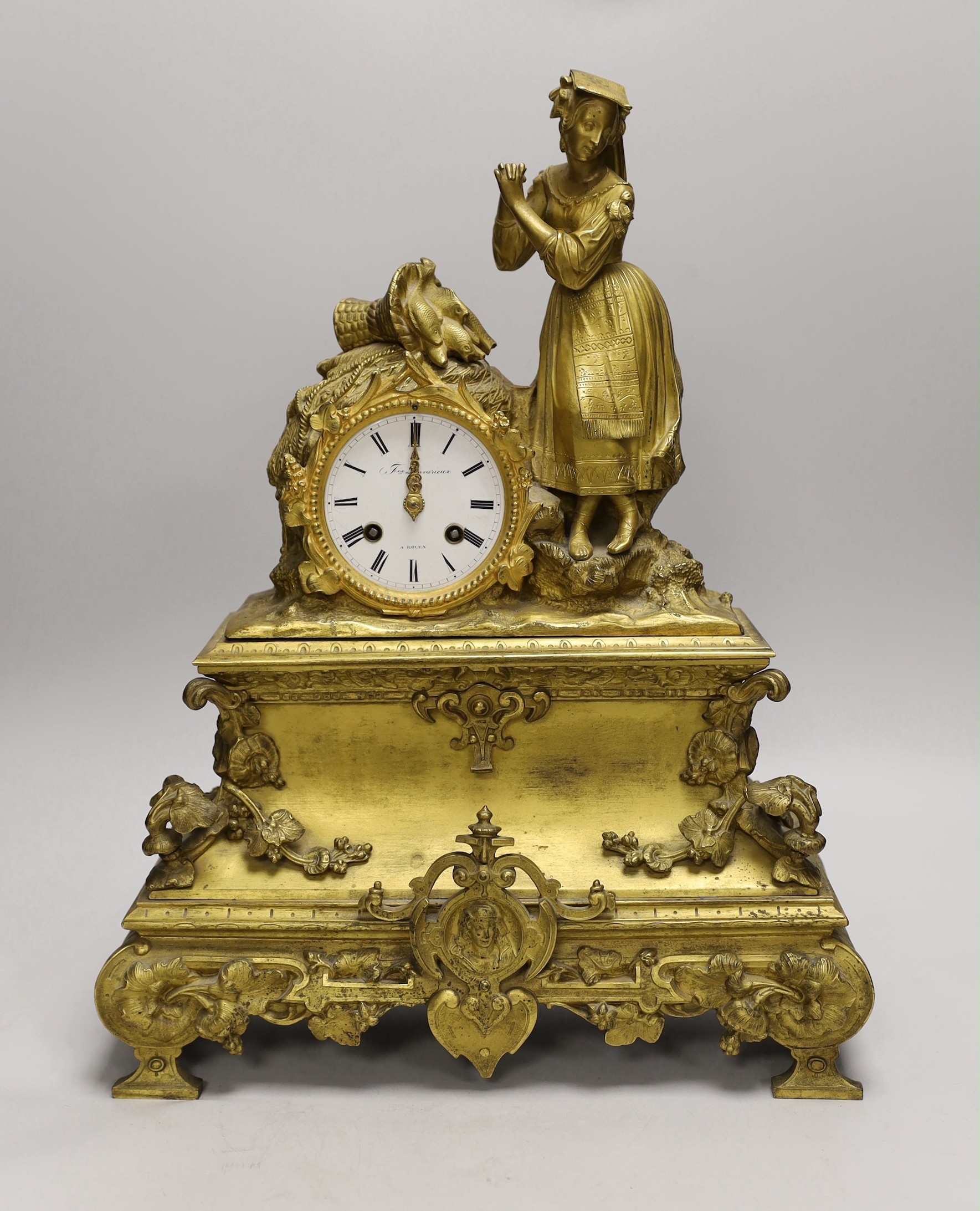 A 19th-century French ormolu mantel clock. 45cm tall                                                                                                                                                                        