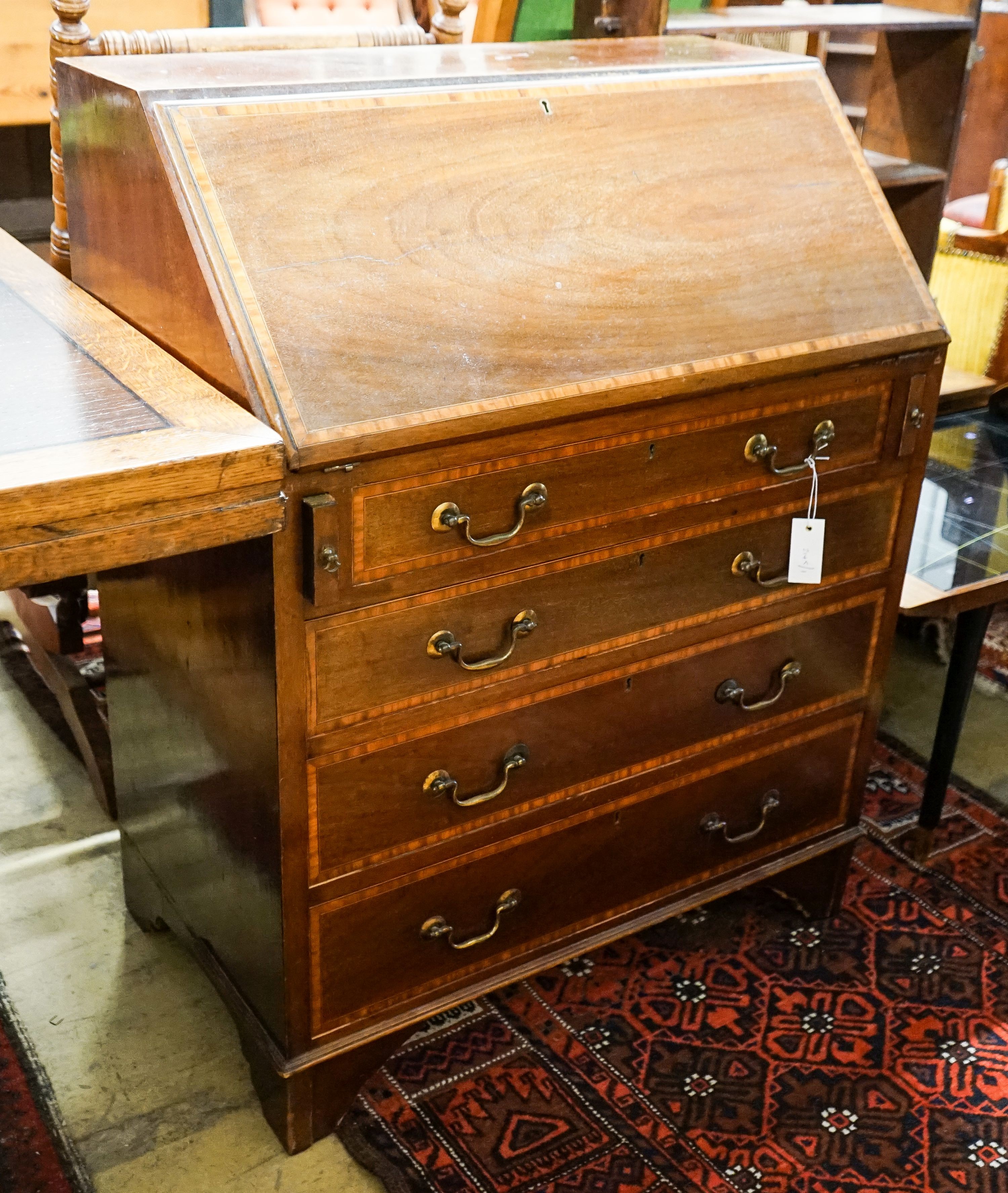 An Edwardian satinwood banded mahogany bureau, width 76cm, depth 46cm, height 98cm                                                                                                                                          