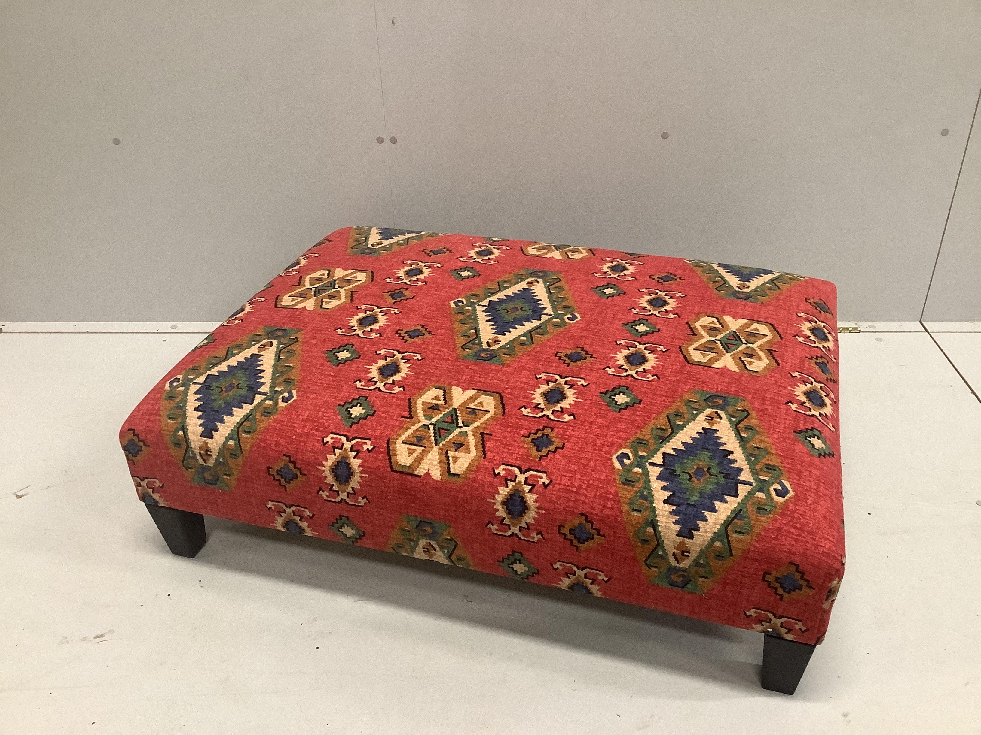 A contemporary rectangular footstool with Kilim style fabric upholstery, width 102cm, depth 74cm, height 28cm                                                                                                               